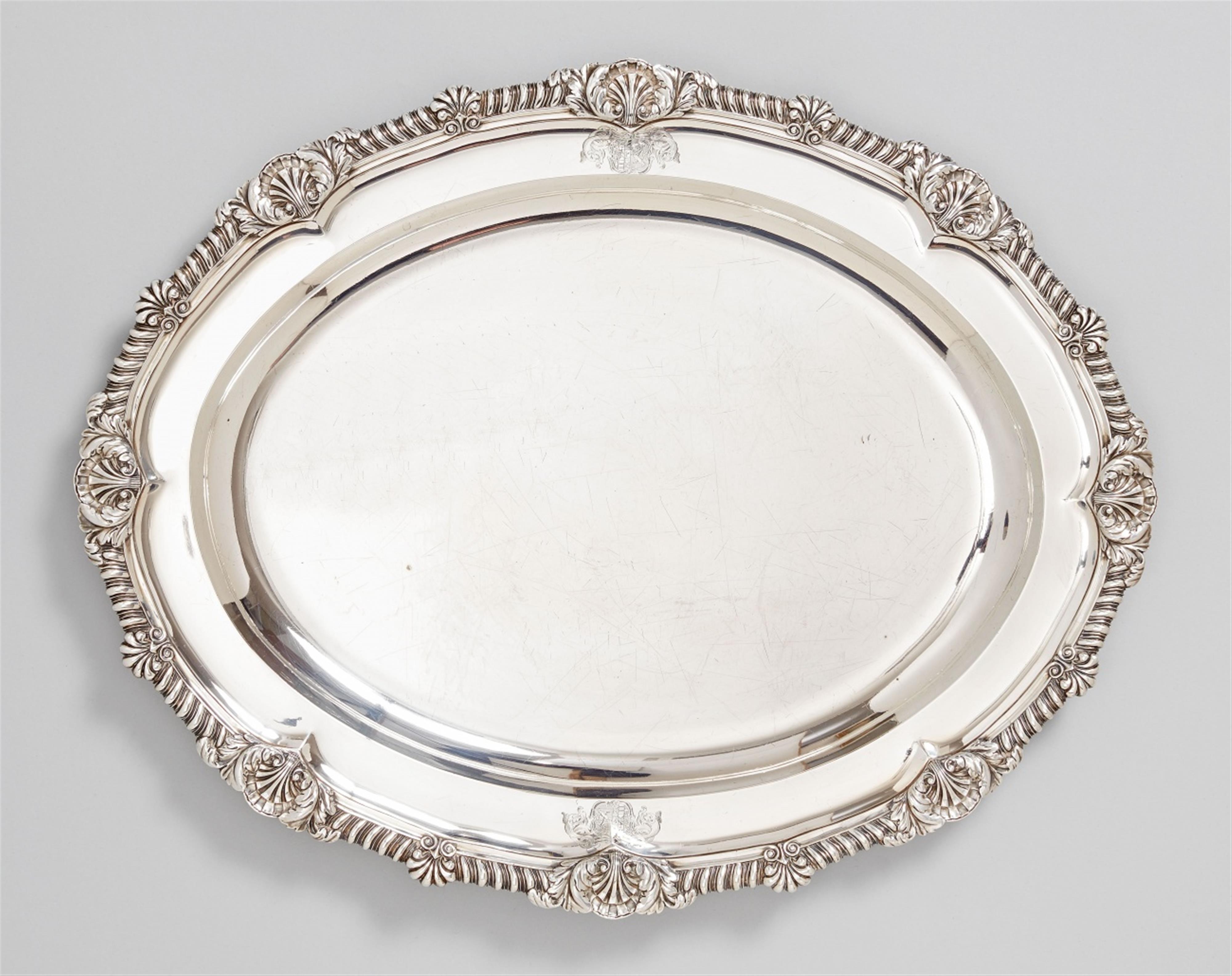 A large George III London silver platter. Engraved with a coat-of-arms to both edges. Marks of Paul Storr, 1810. - image-1