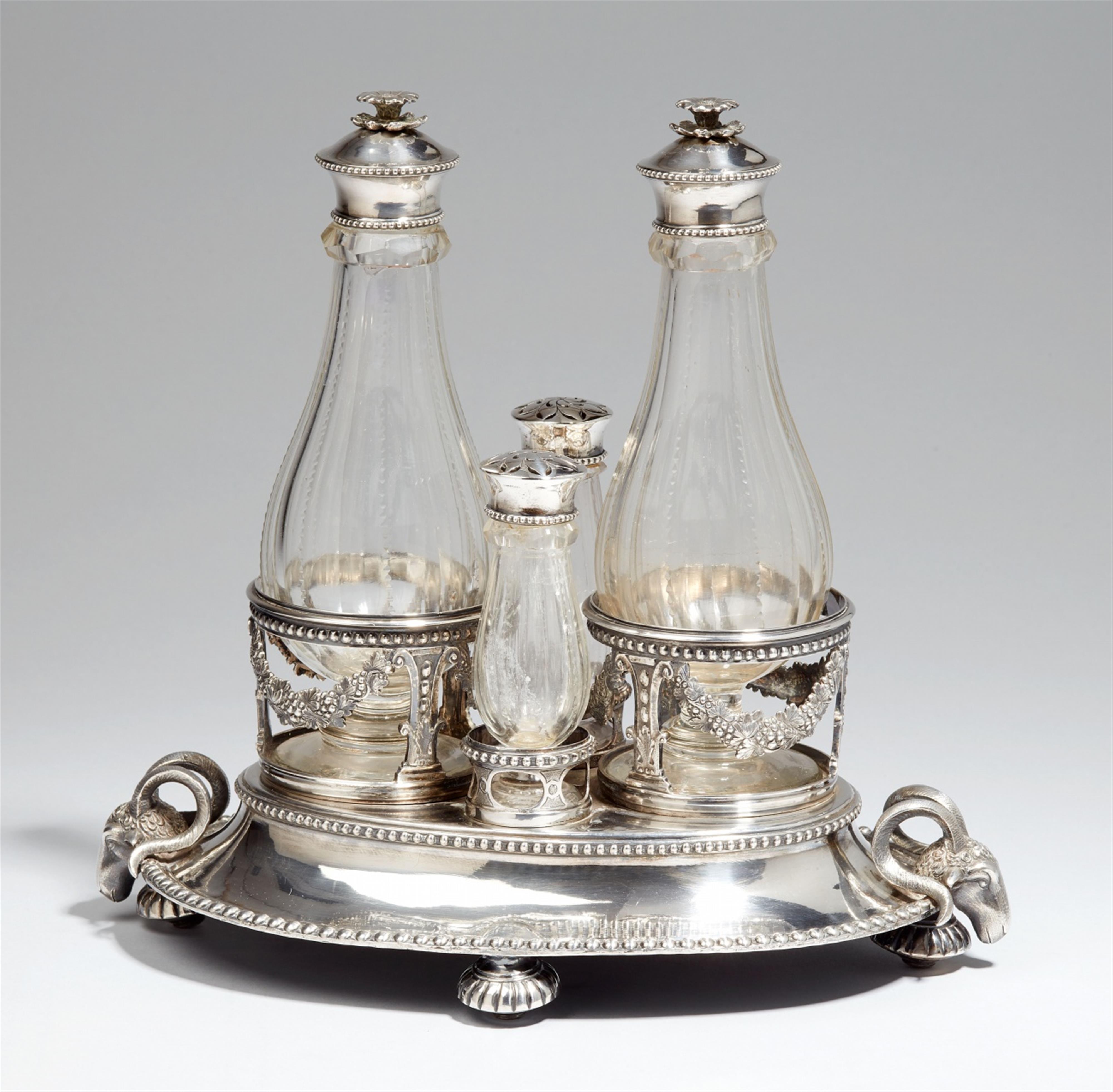 A Stockholm silver cruet stand. The glass bottles with silver lids, one bottle chipped. Marks of Mikael Nyberg, 1783. - image-1