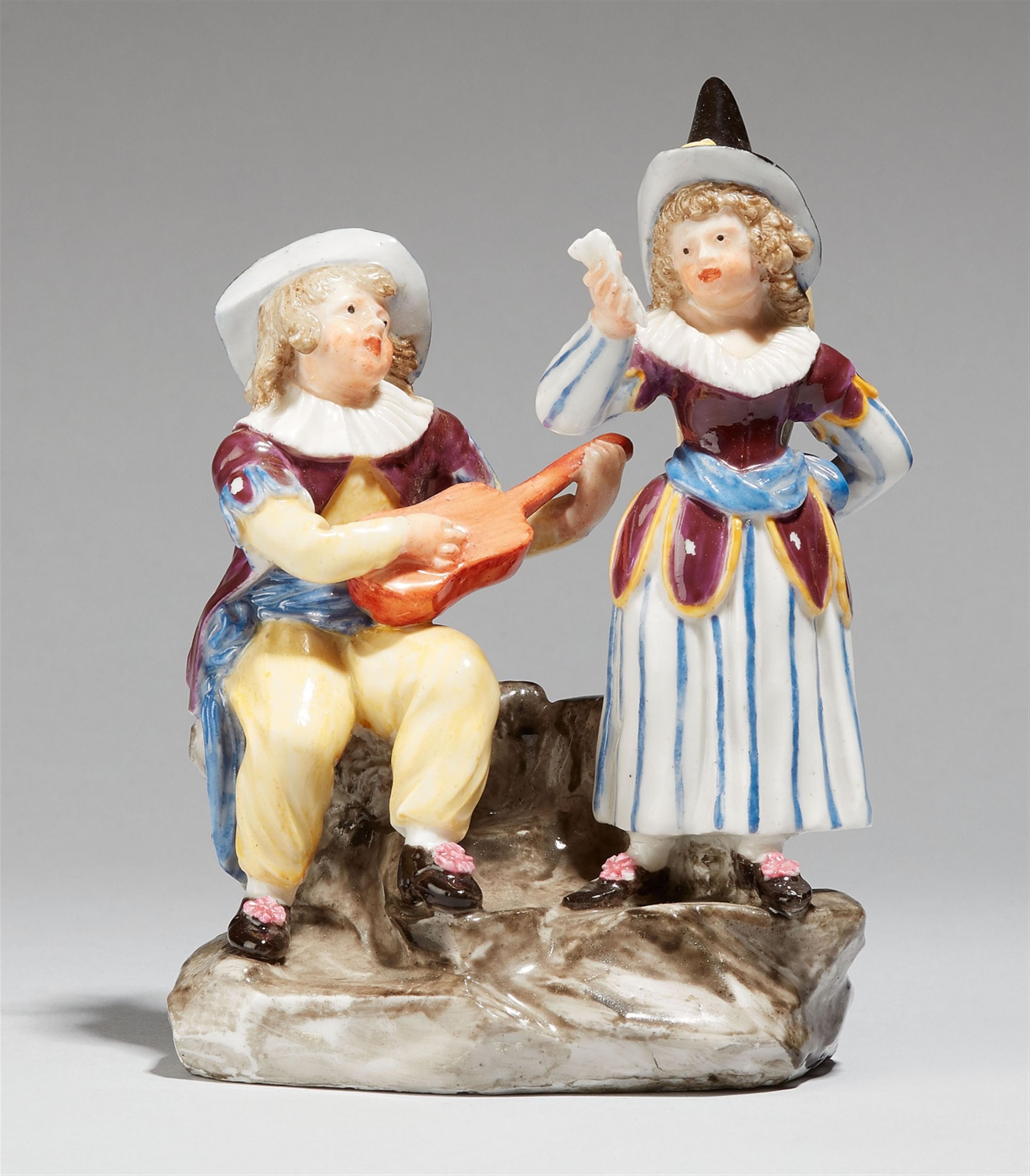 A Neapolitan porcelain model of two street musicians - image-1