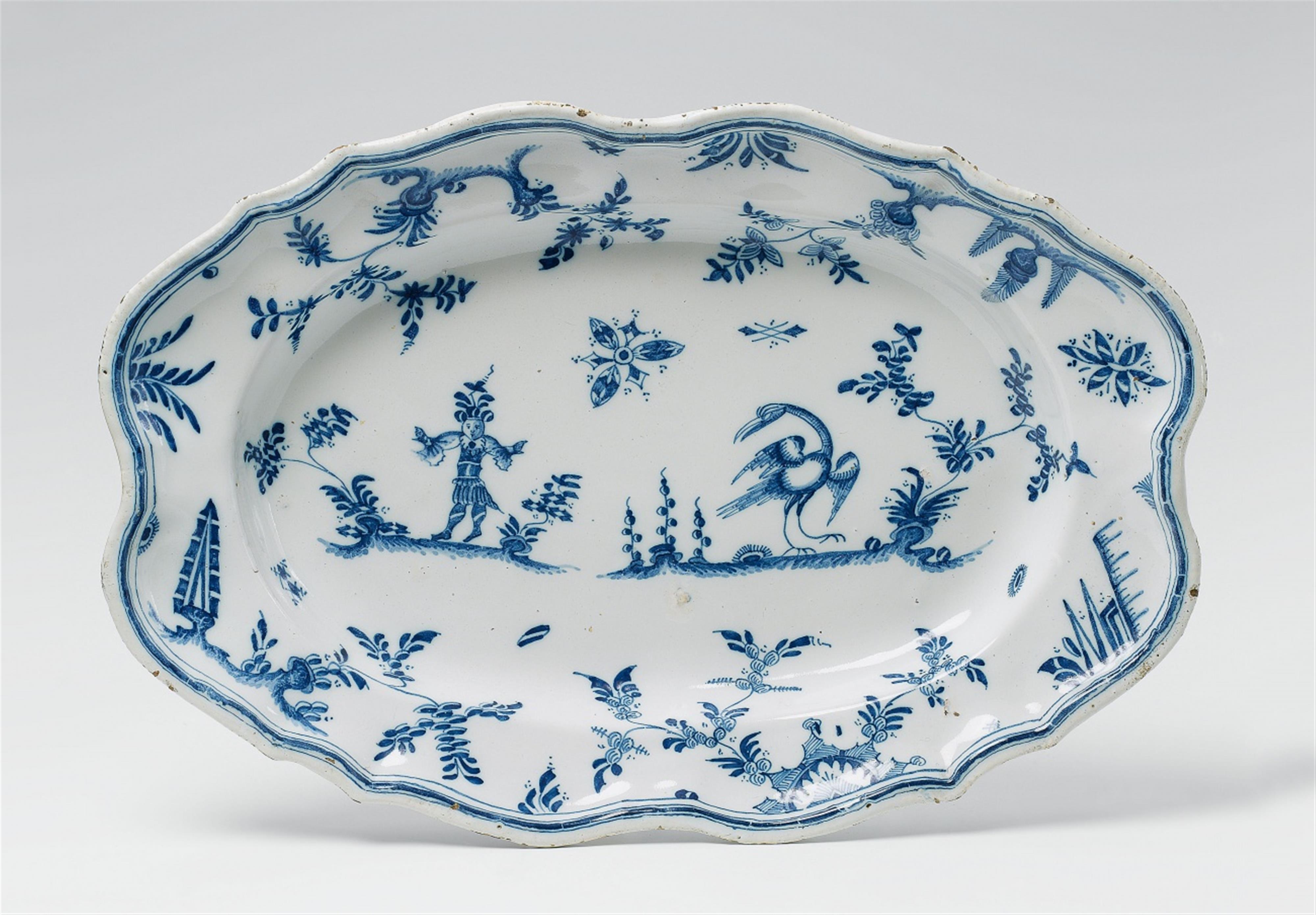 An oval Alcora faience dish with blue "grotteschi" decor - image-3