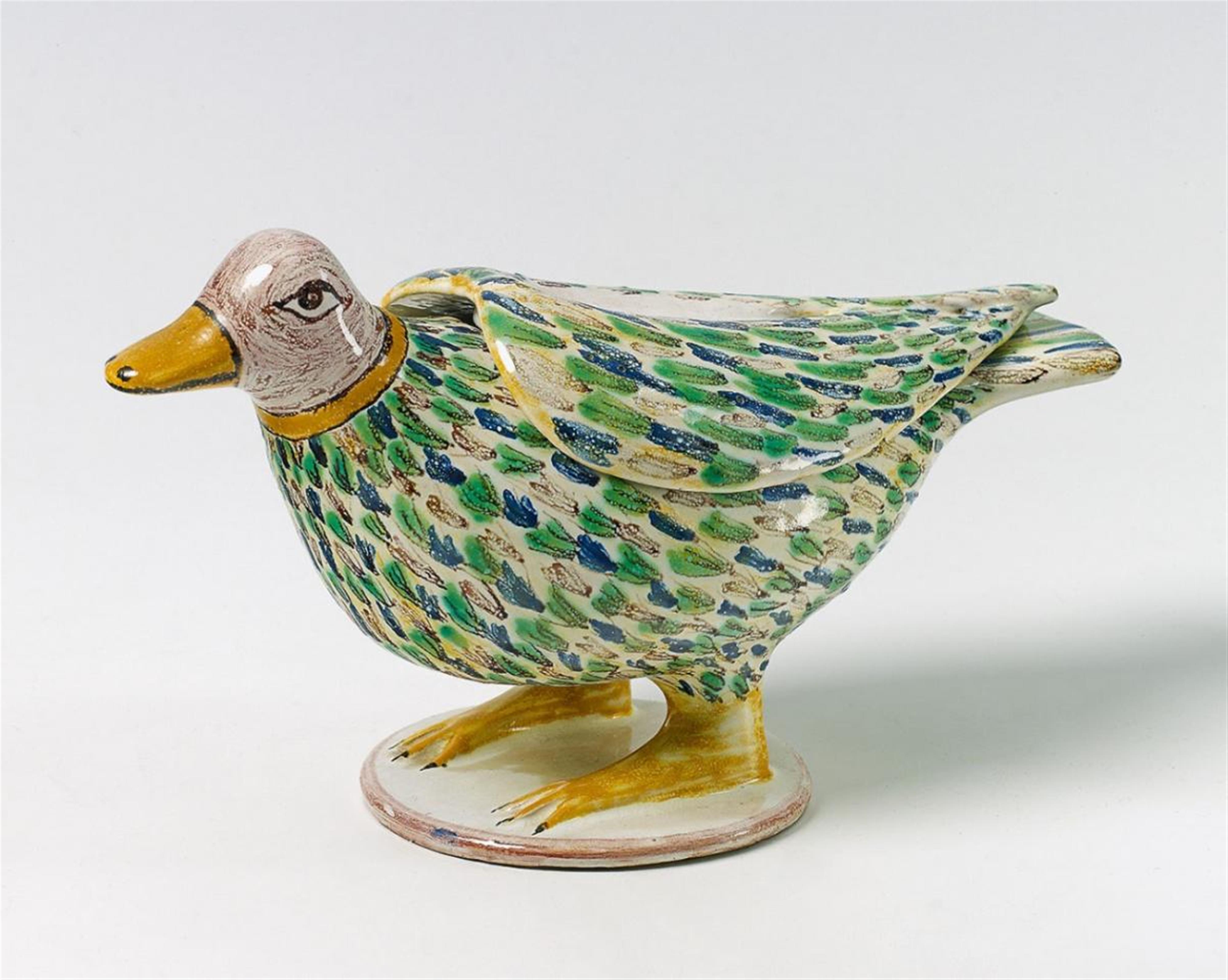 A Continental faience tureen and cover formed as a bird. - image-1