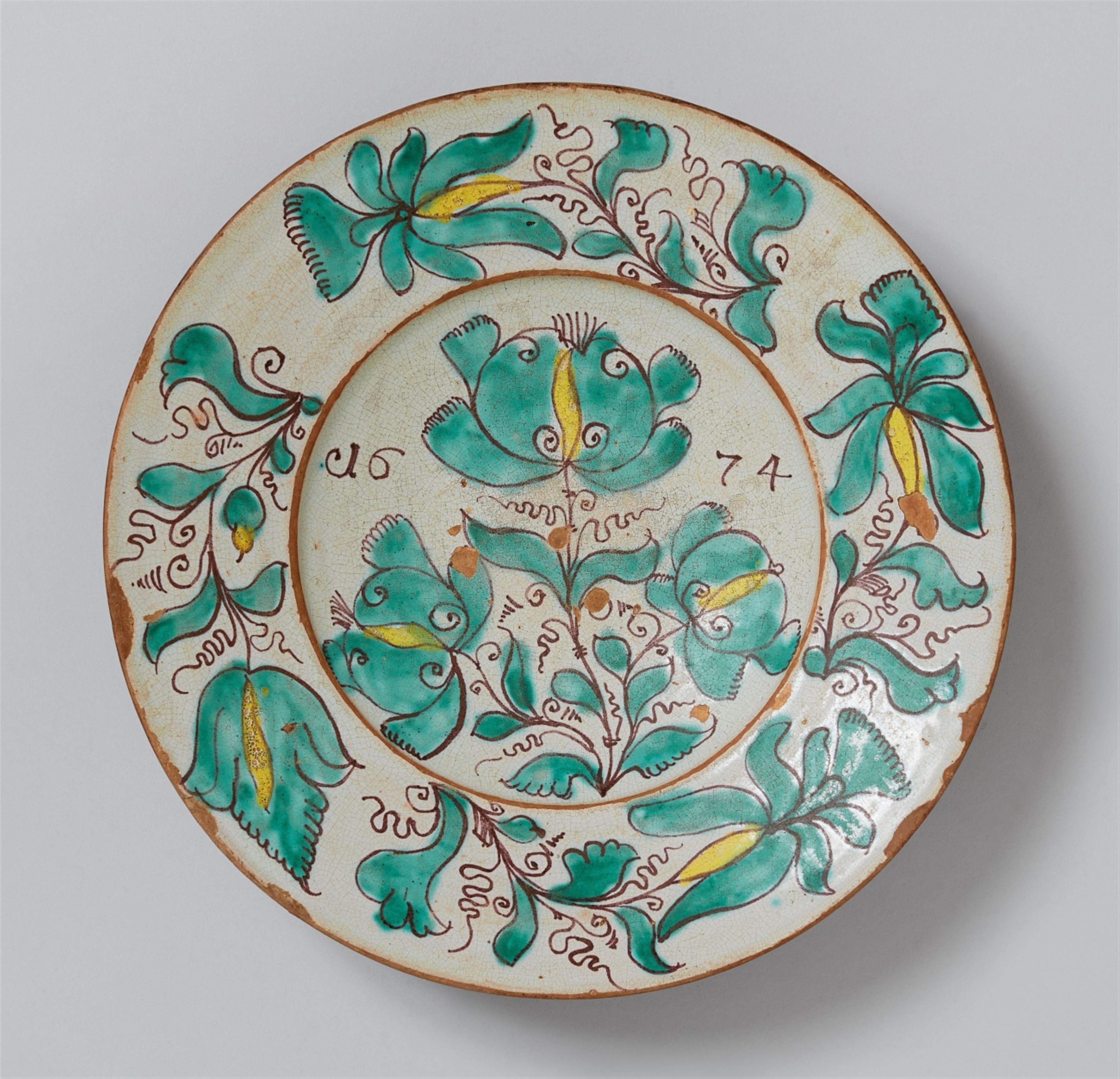 A Zittau tin-glazed earthenware dish with stylised floral decor - image-1