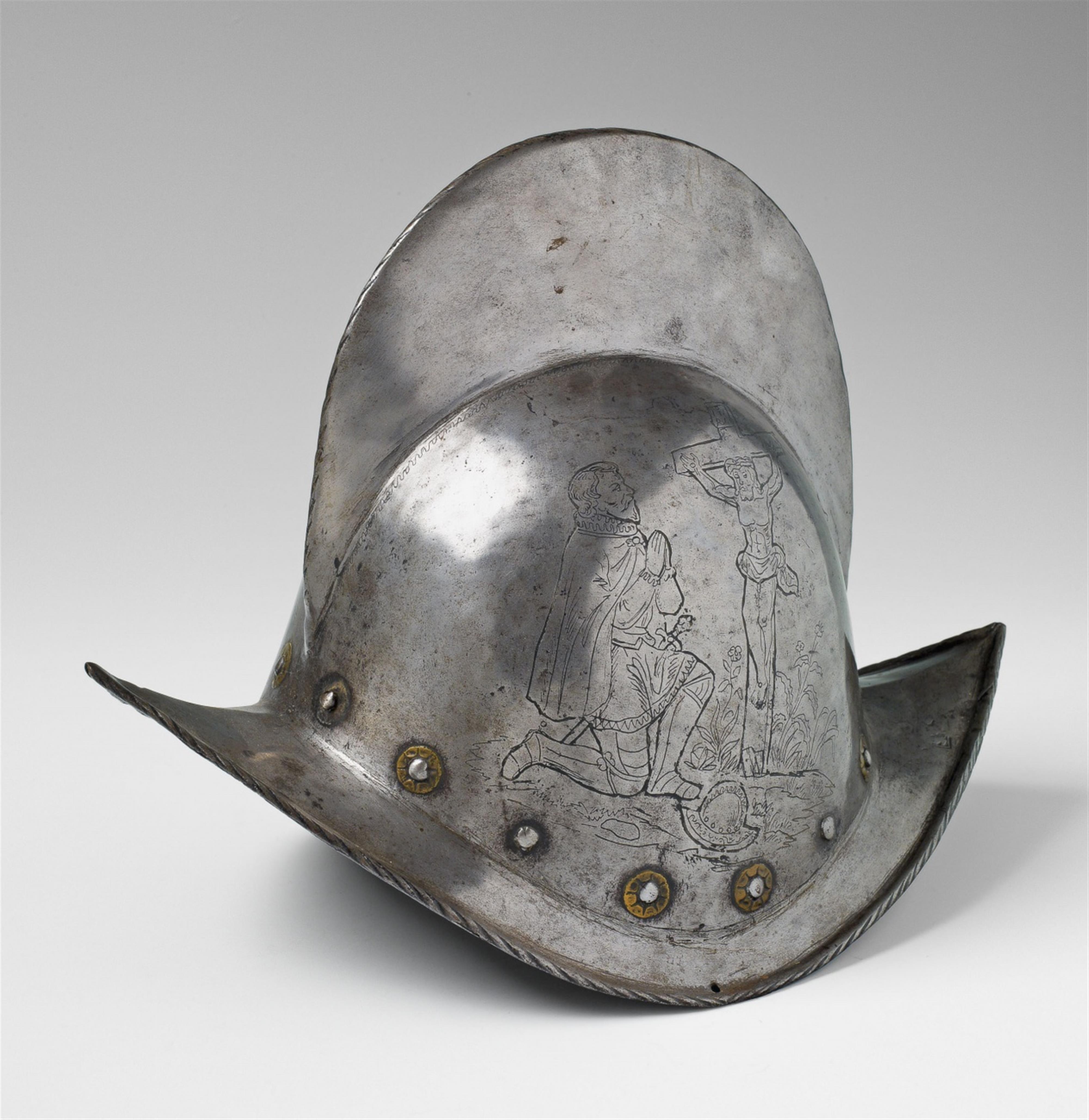 A cast iron morion engraved with the crucifixion - image-1