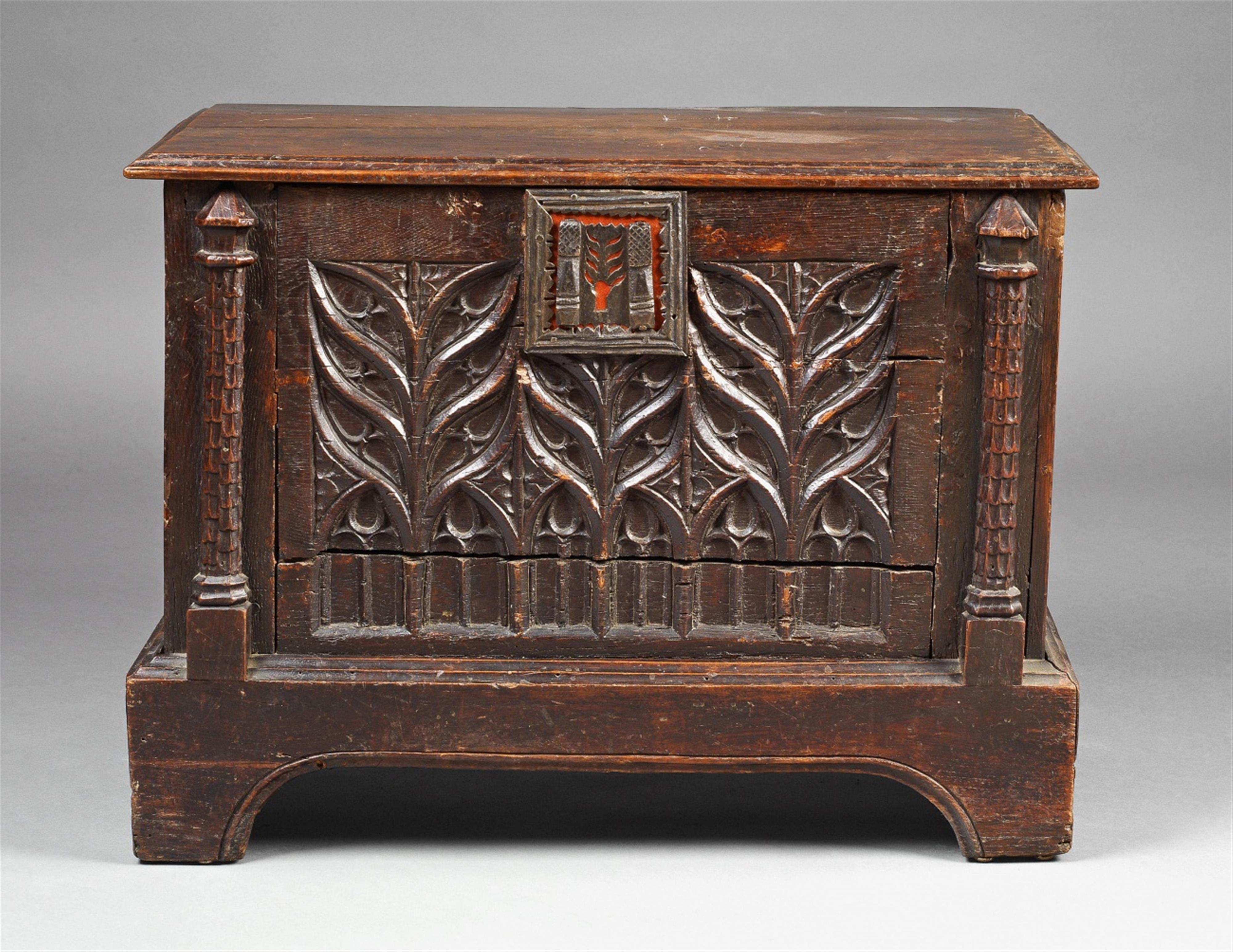 A small gothic cast-iron mounted oak chest - image-1