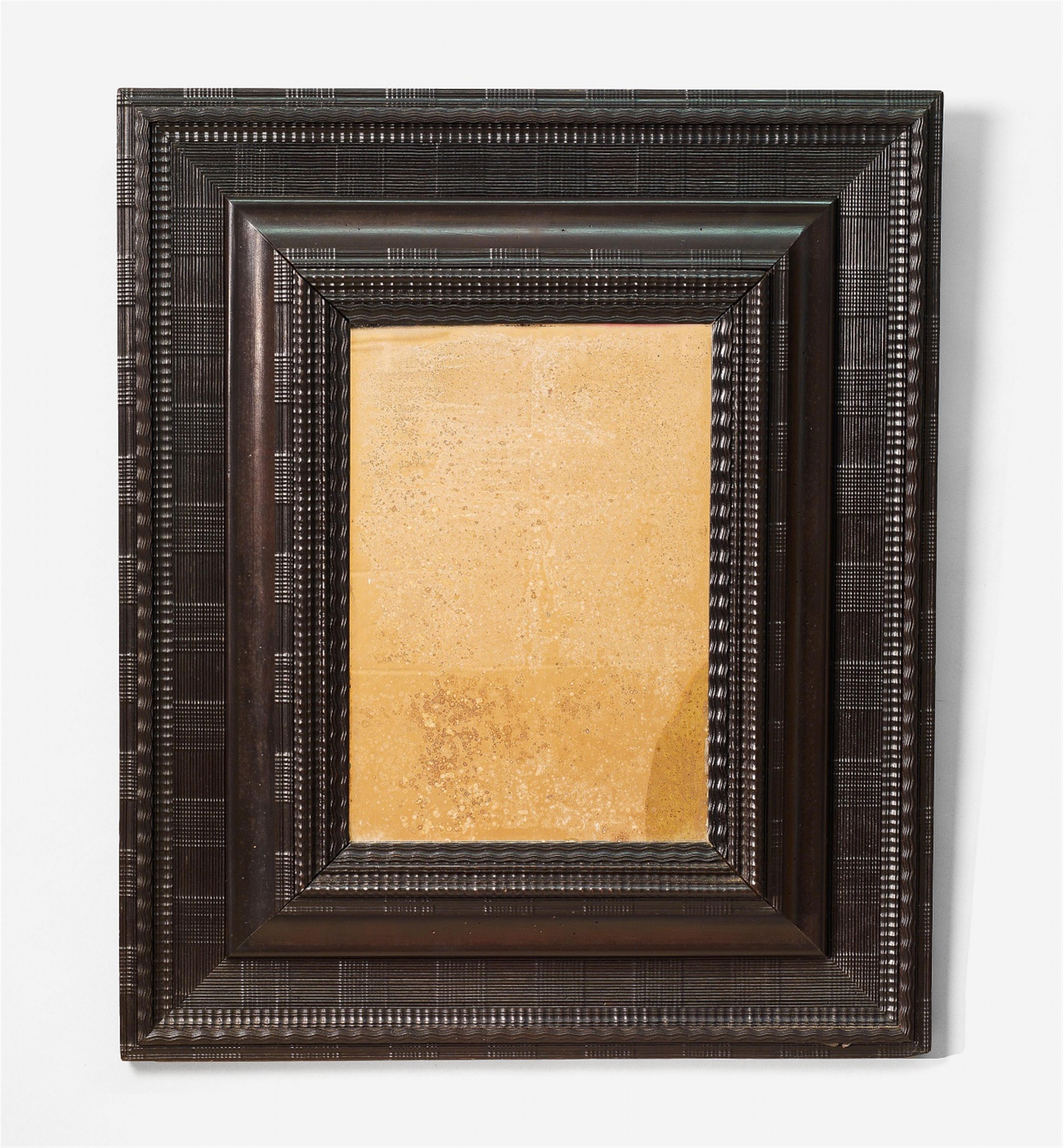 A Netherlandish moulded ebony and ebonised wood frame - image-1