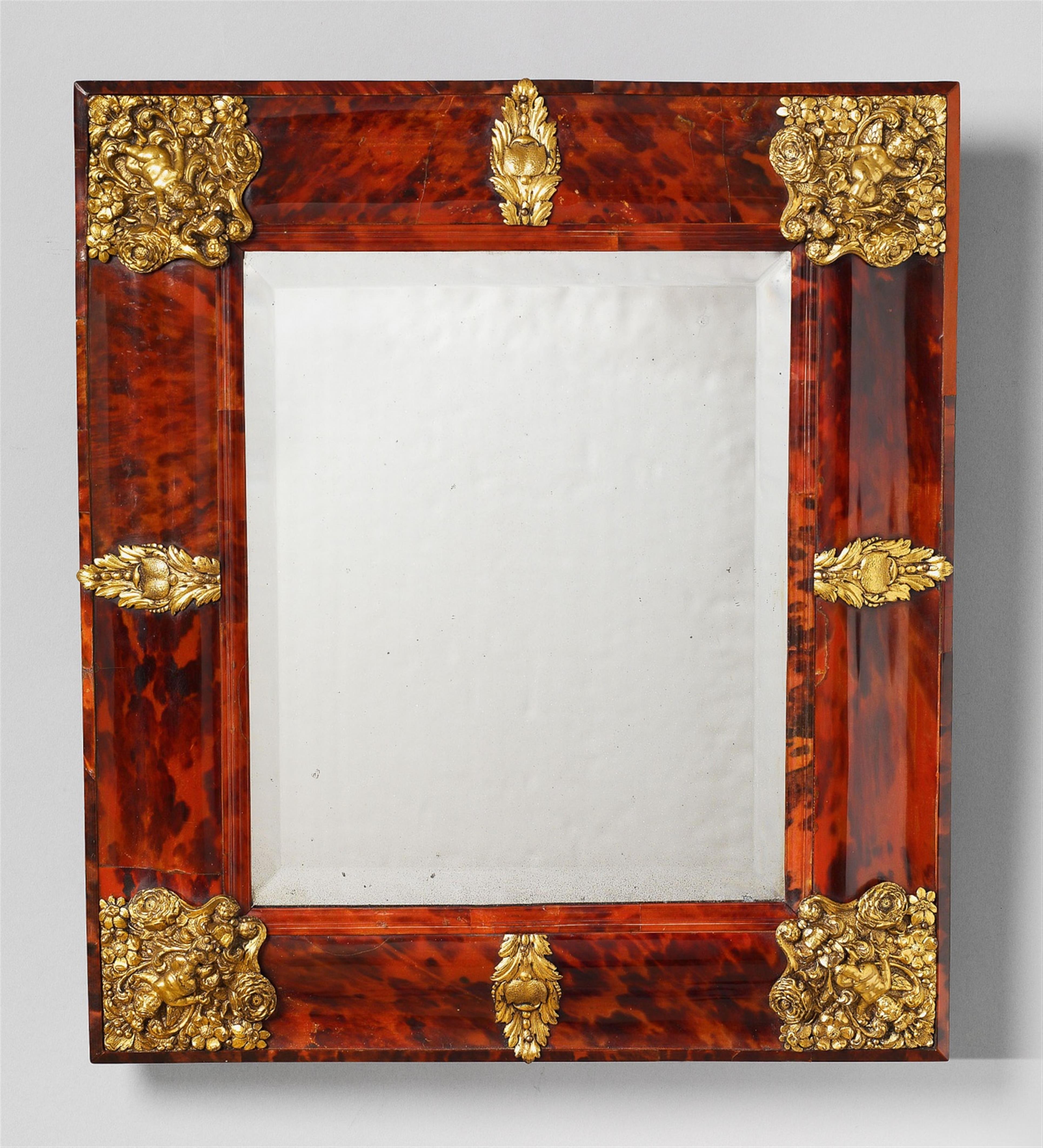A small French Louis XIV ormolu-mounted tortoiseshell mirror - image-1