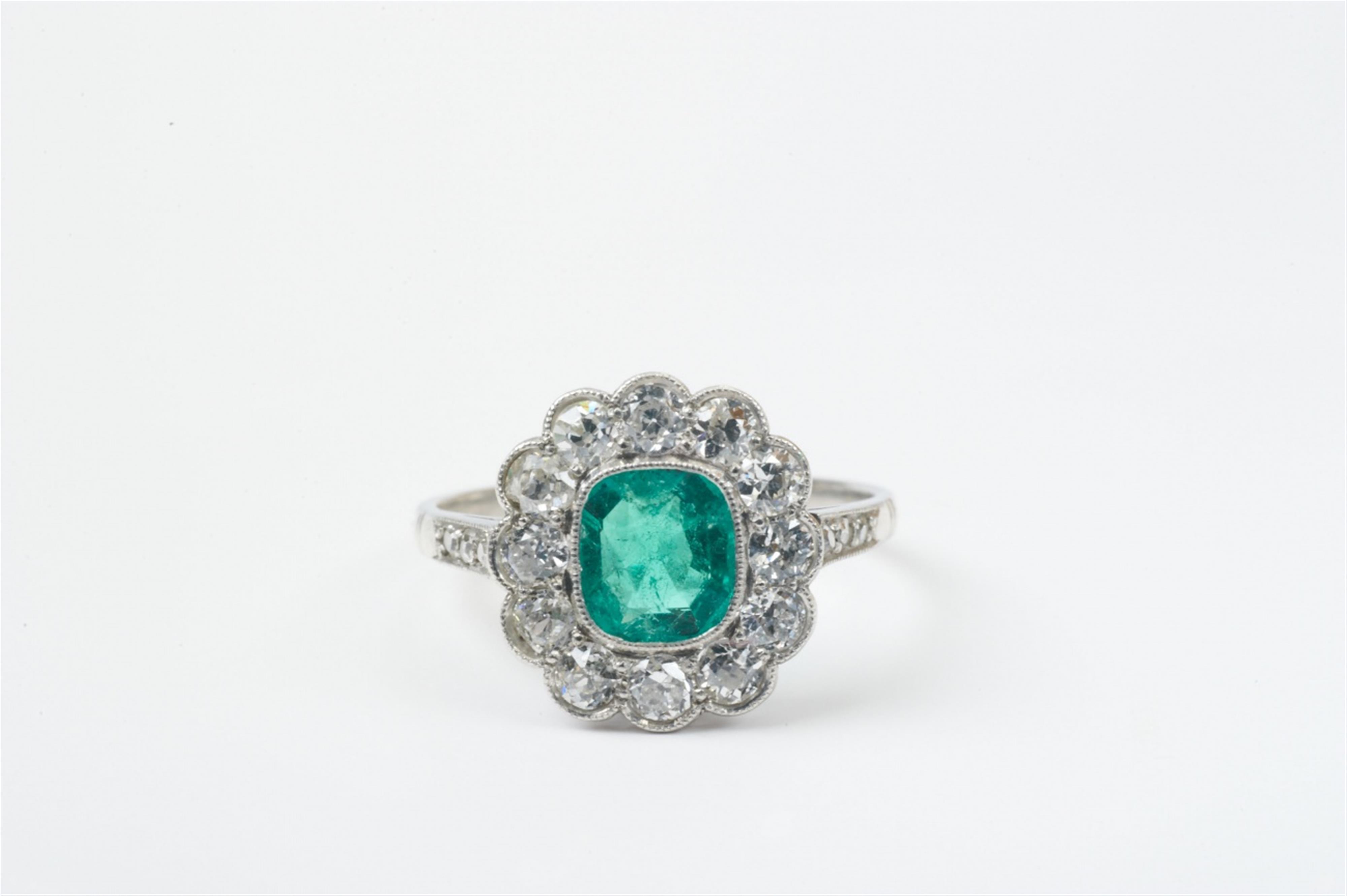 A platinum, emerald and old-cut diamond cluster ring - image-1