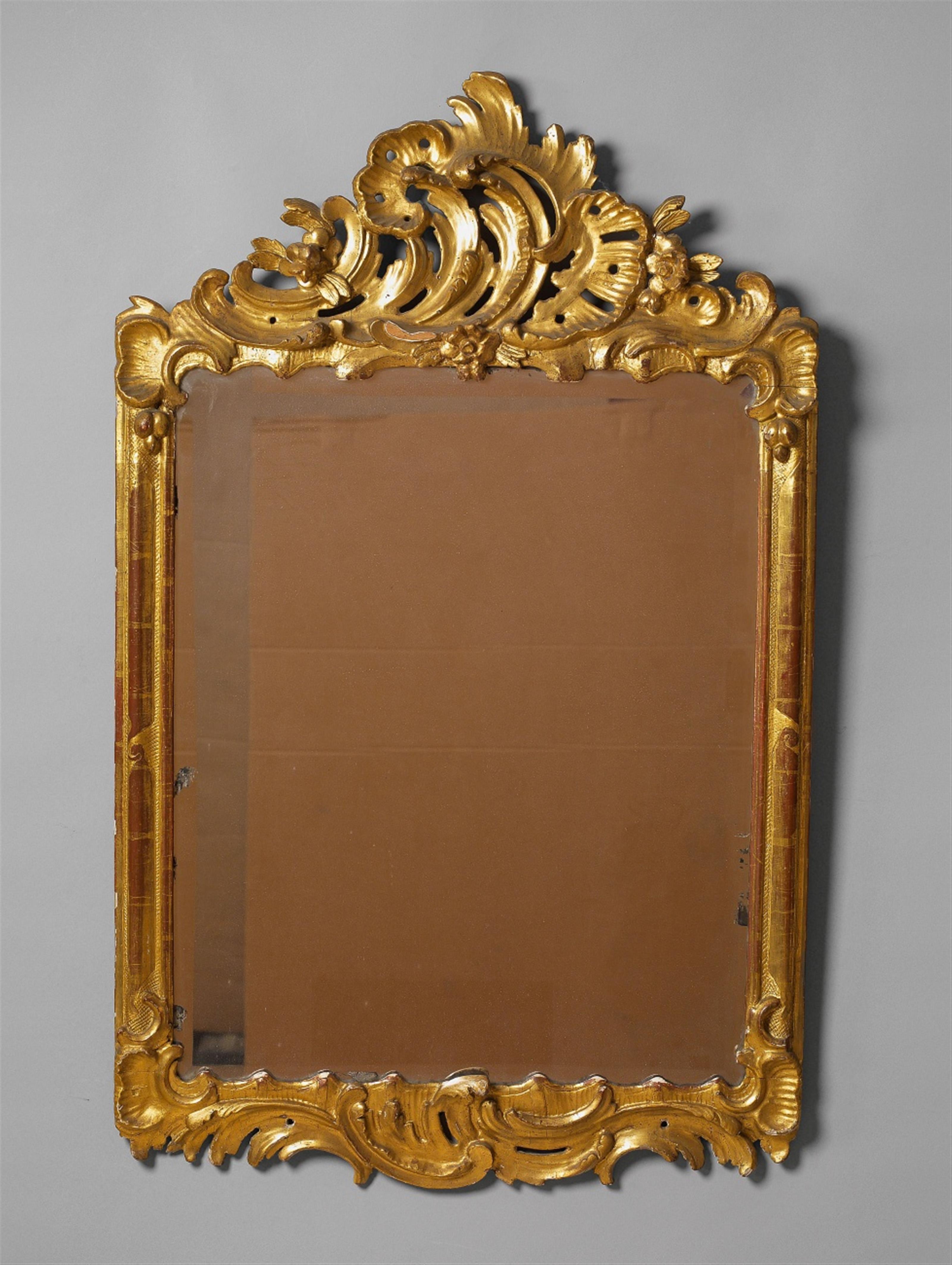 A rococo giltwood mirror - image-1
