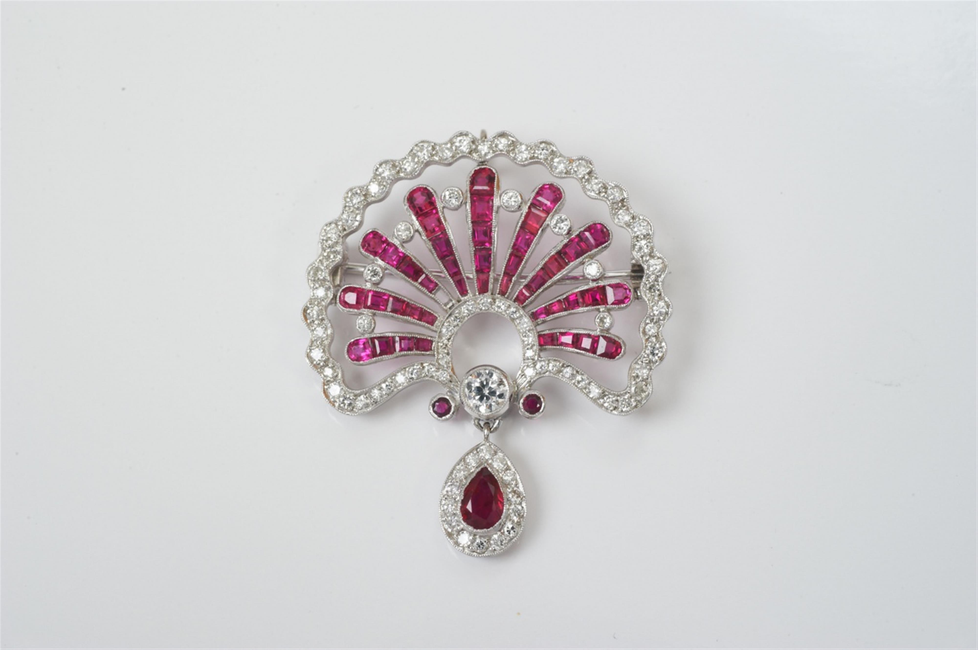 A platinum, diamond and ruby Art Deco brooch - image-1