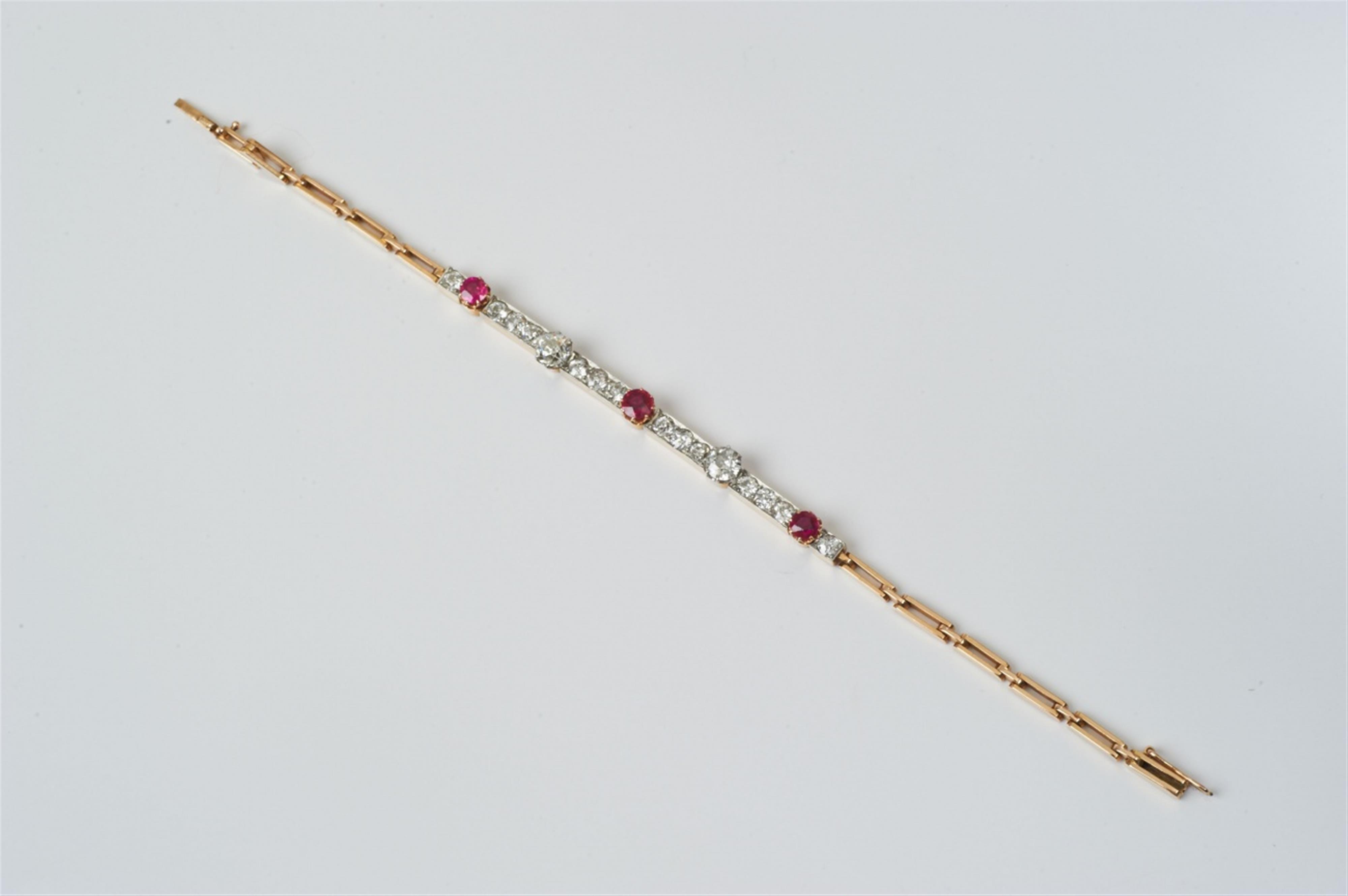 An 18k gold, diamond and synthetic ruby Art Deco bracelet - image-1