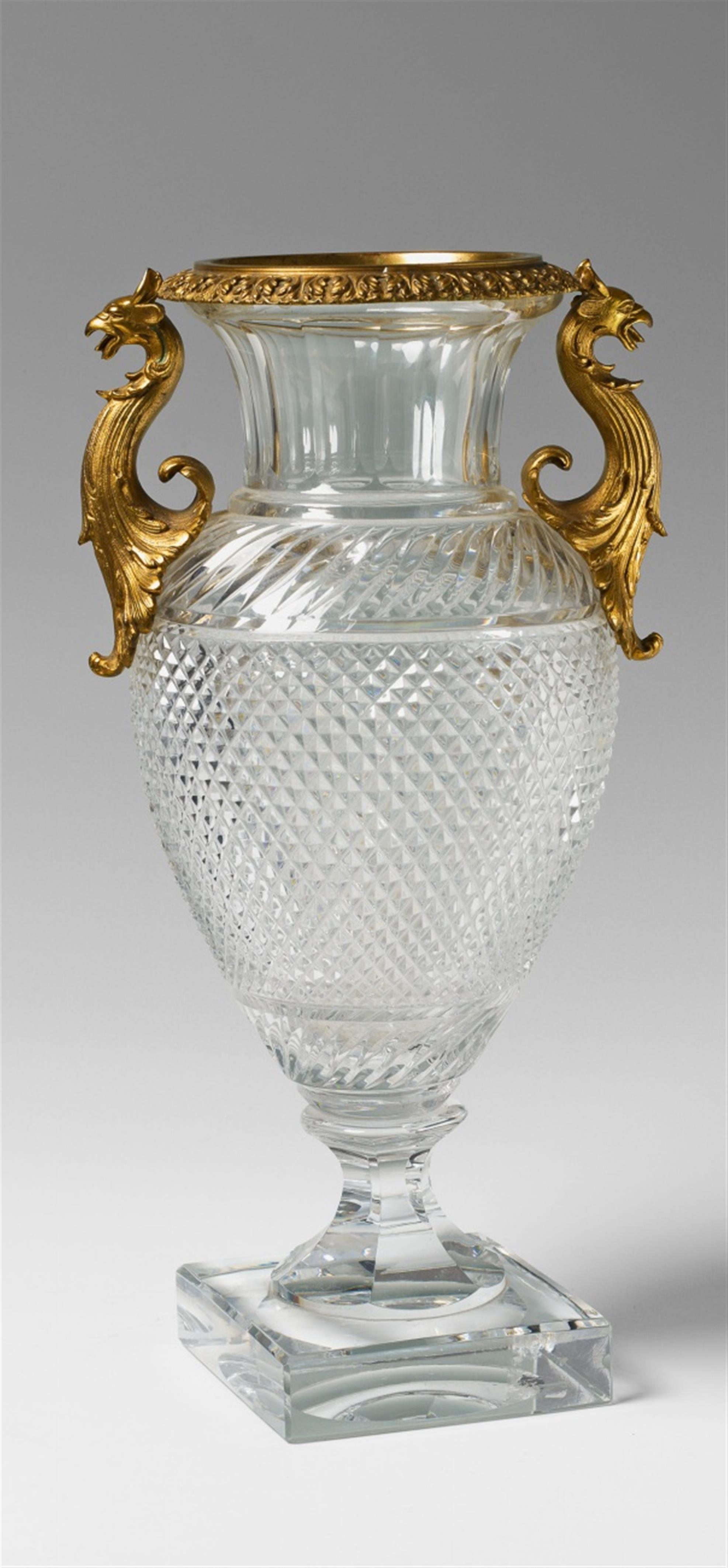 An ormolu mounted glass vase with griffon-form handles - image-1