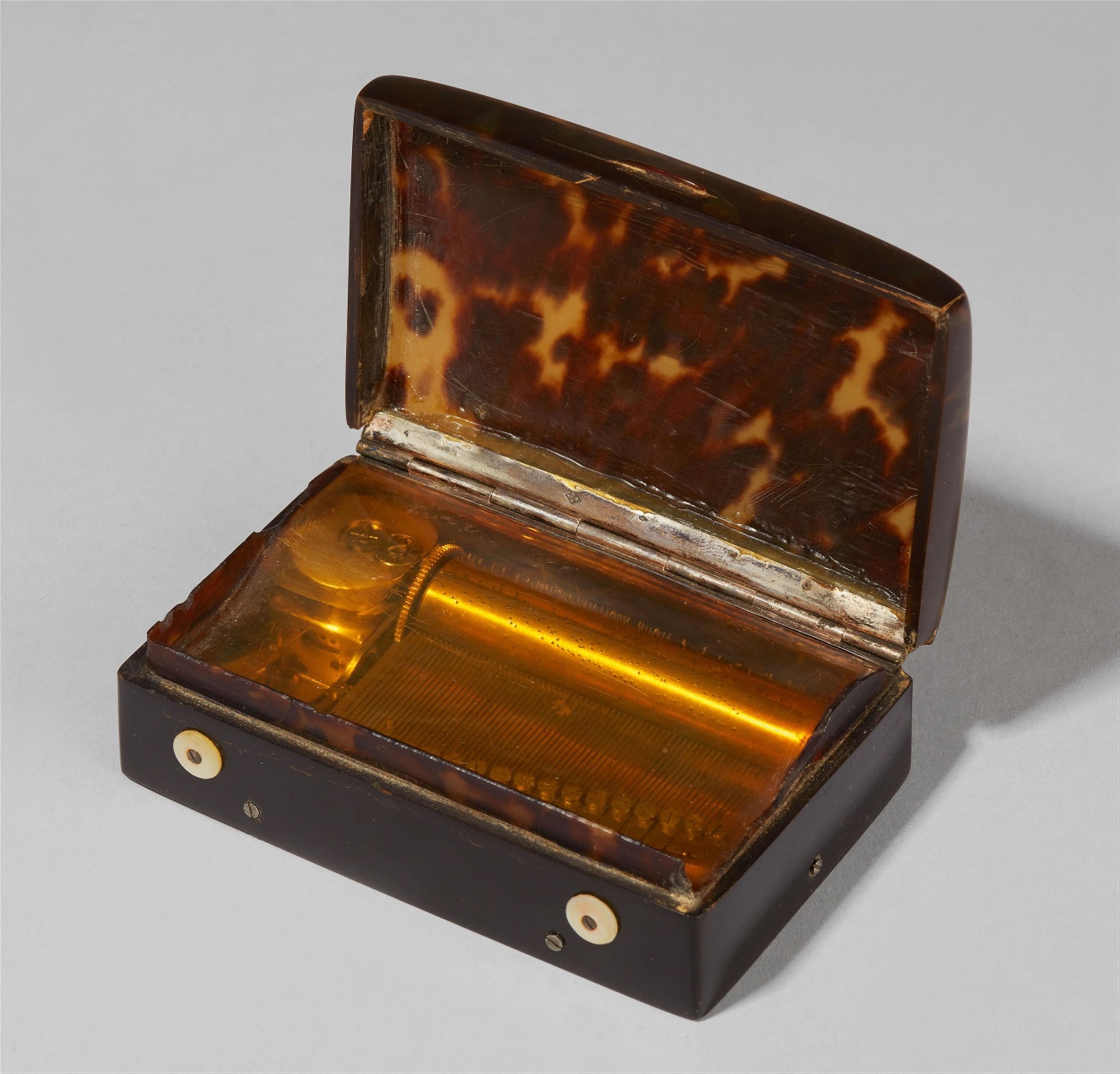 A rare silver-mounted tortoiseshell musical box - image-1