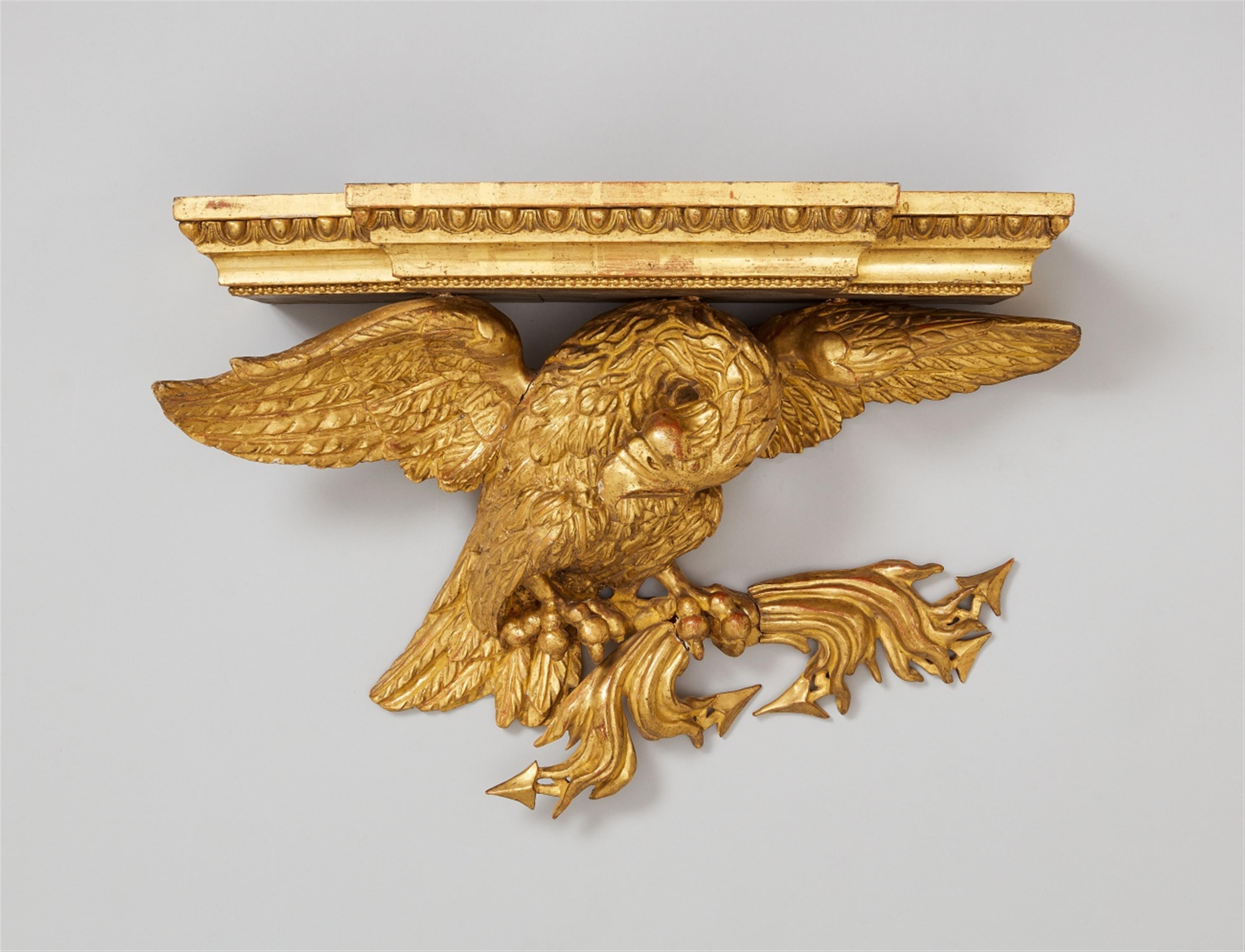 An iron-mounted giltwood bracket with an eagle - image-1