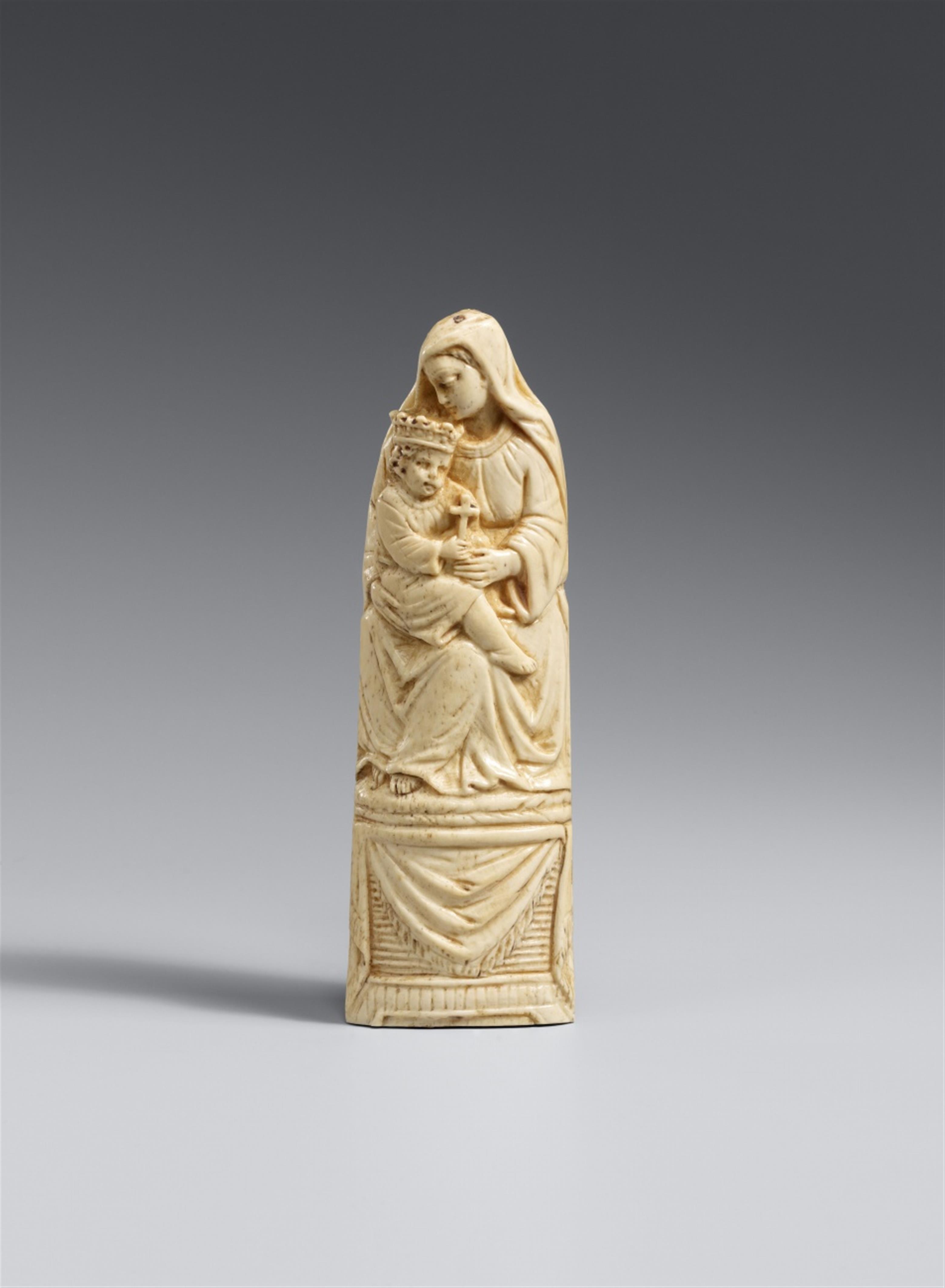 Probably Italy 16th century - A probably Italian 16th century carved ivory figure of the Virgin enthroned - image-1