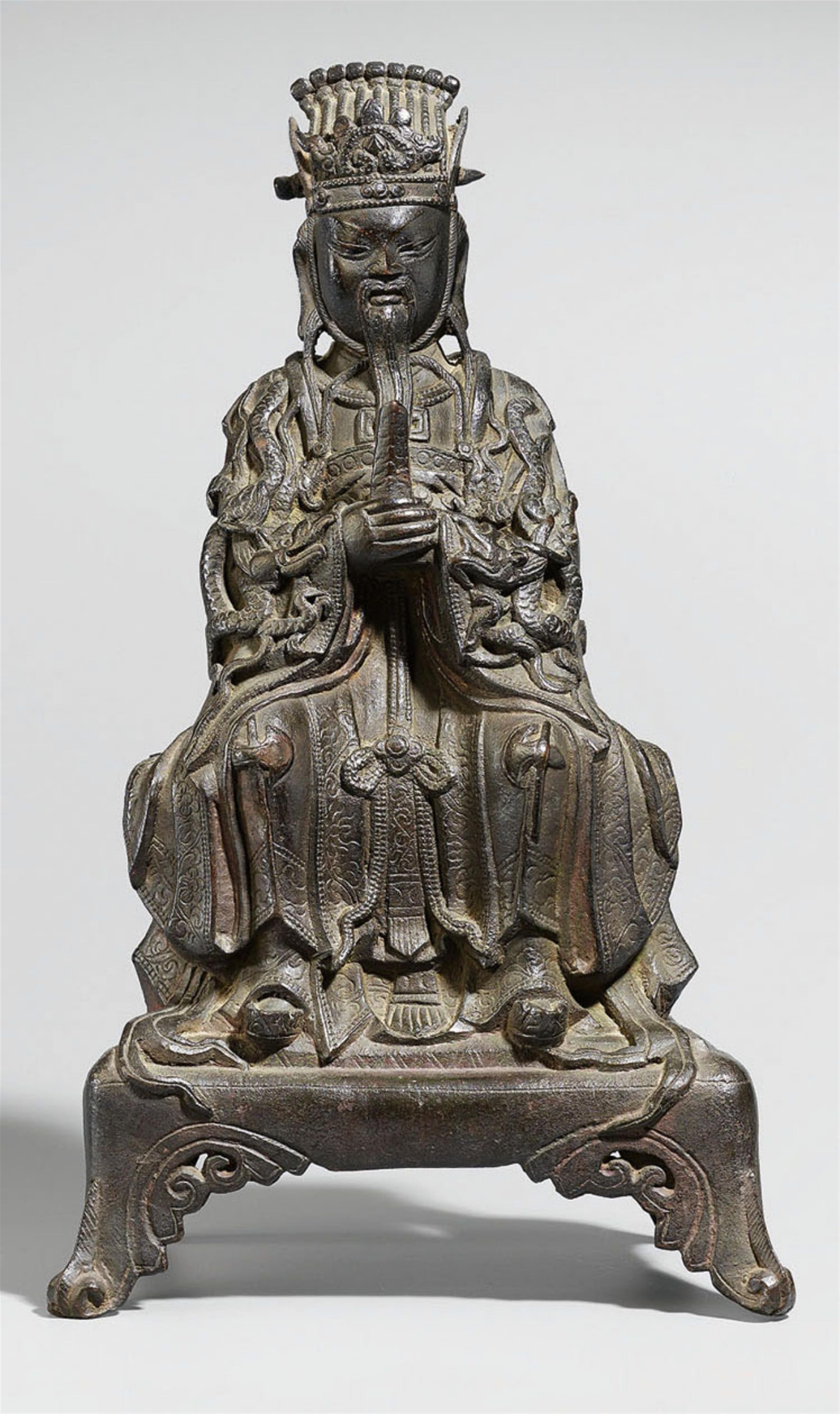 A bronze figure of a deified emperor. Ming dynasty, dated 1574 - image-1