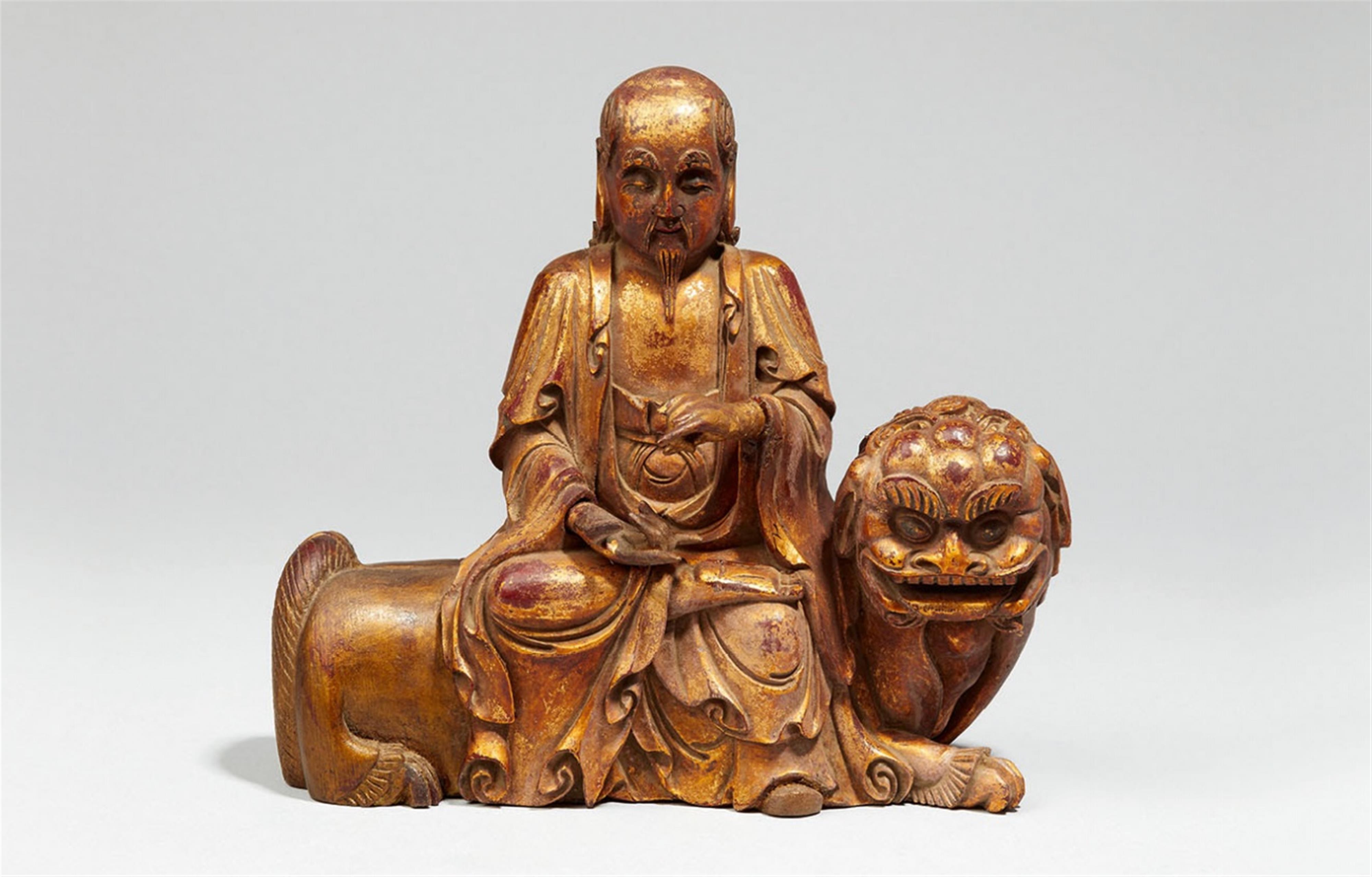 A lacquered and gilded wood figure of a bearded deity. 19th century - image-1