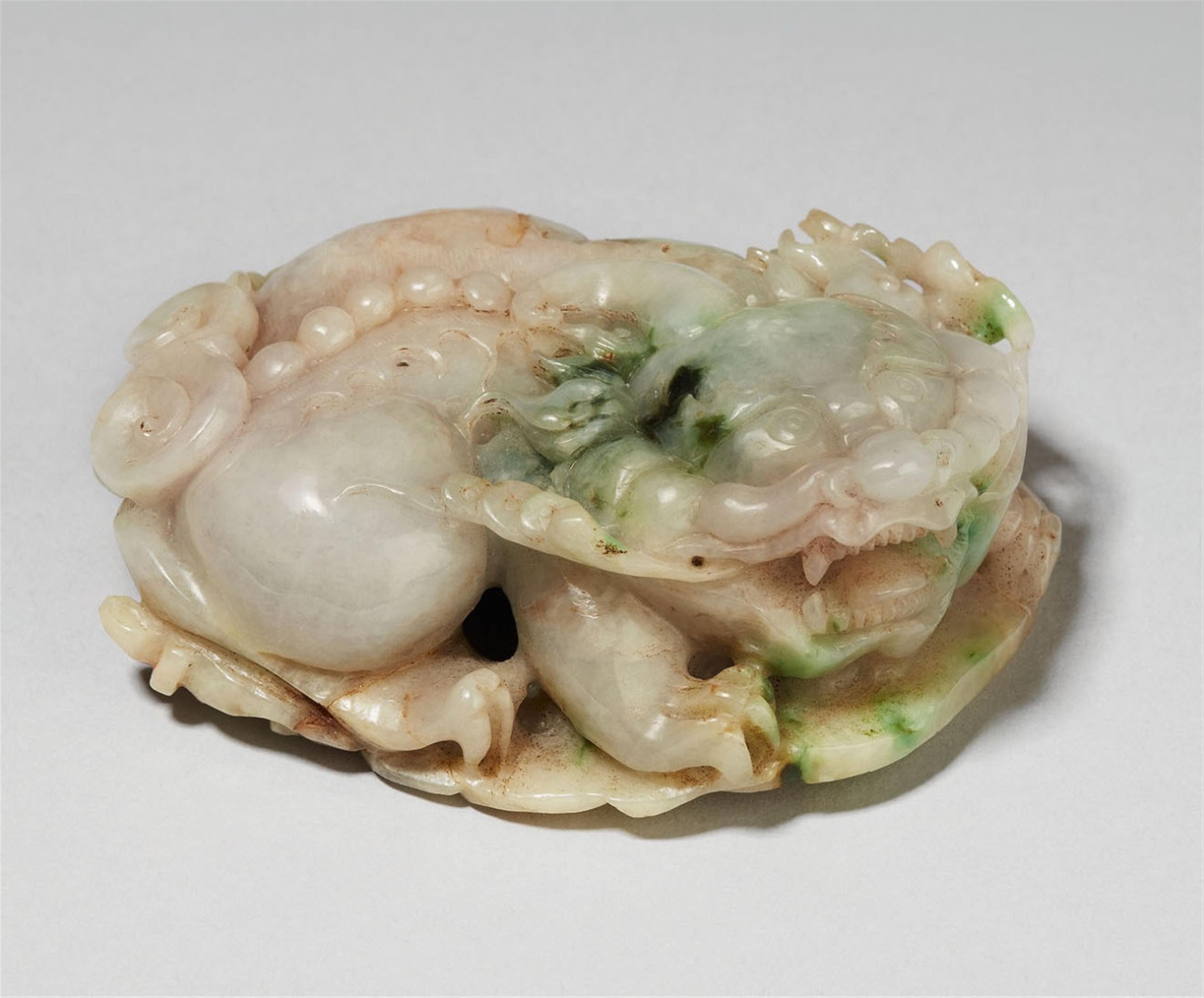 A white and apple-green jadeite carving of a pixiu. 19th century - image-1