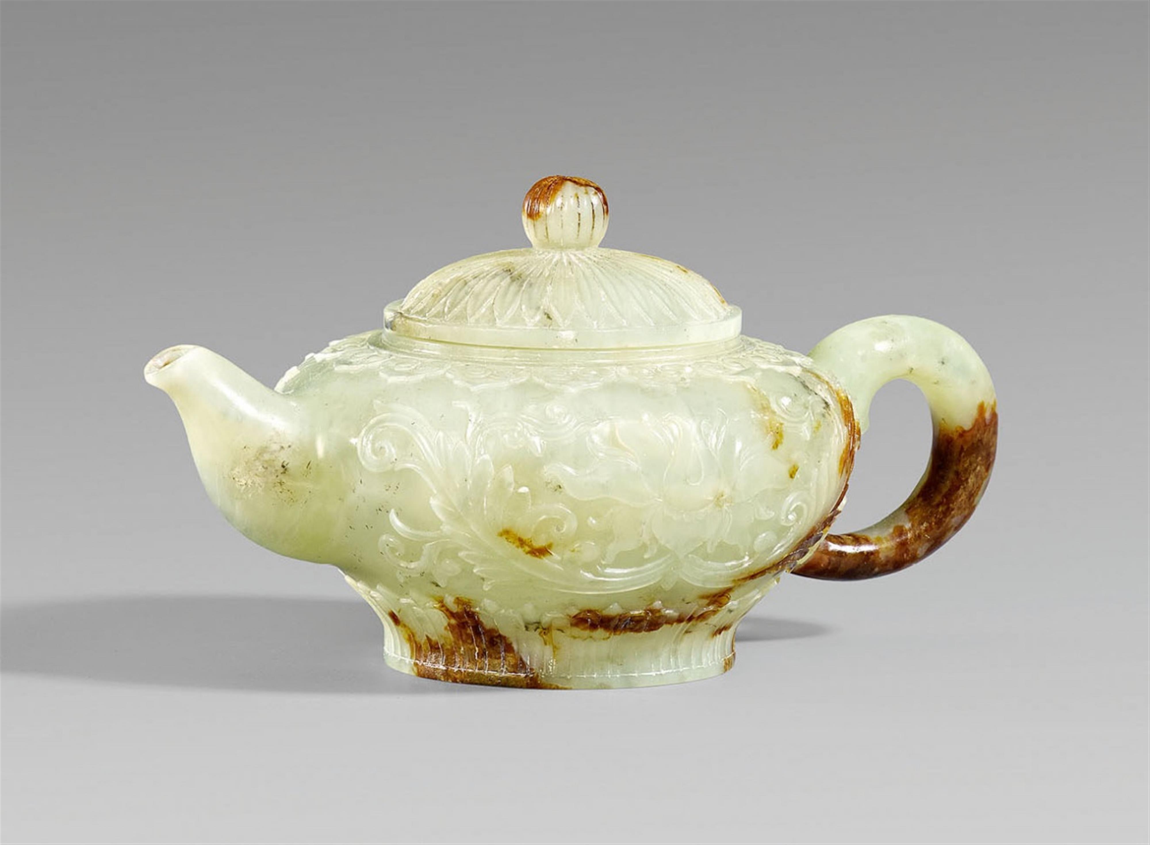 A light green jade teapot. 20th century - image-1