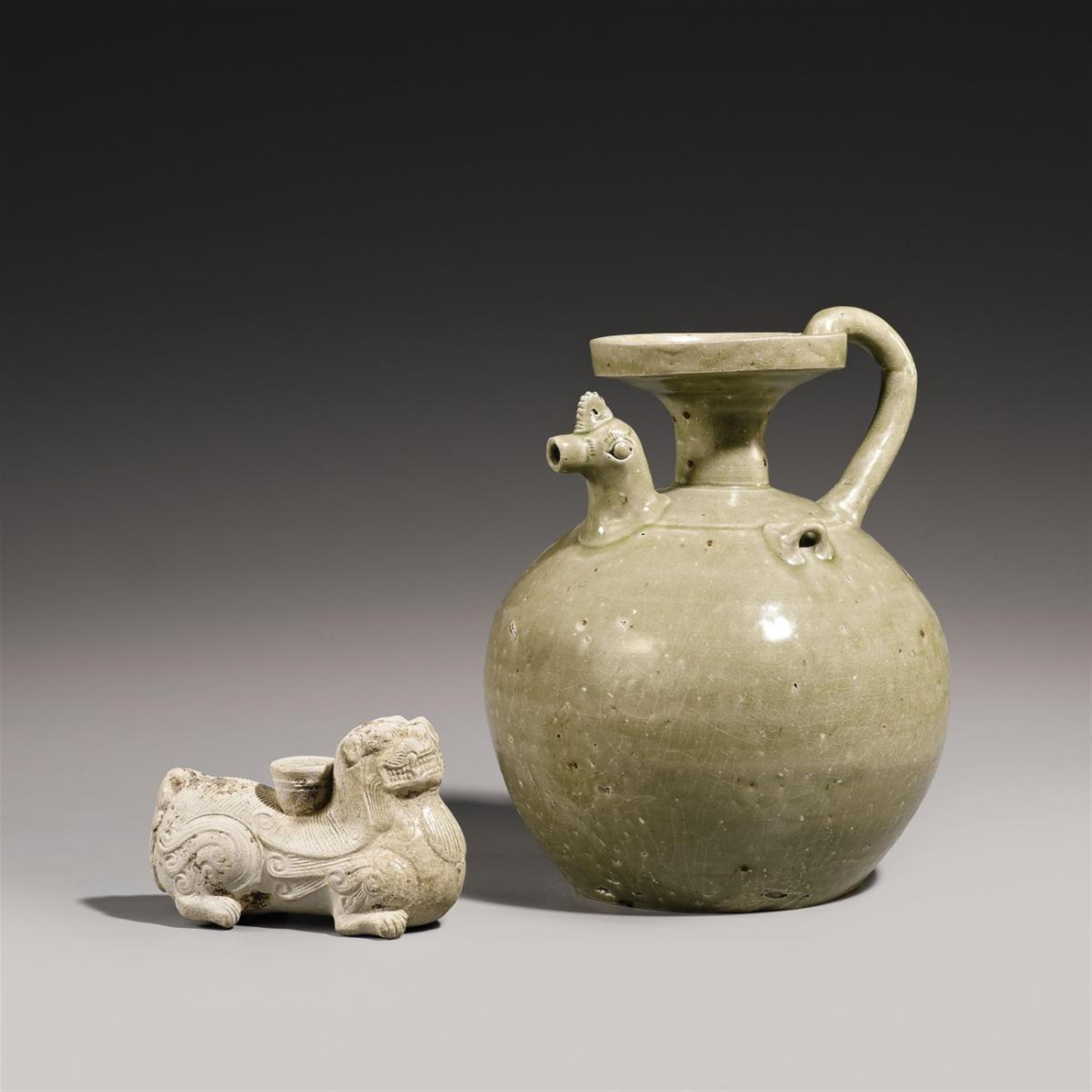 A Yueyao chicken-head ewer and a celadon-glazed lion candlestick. 4th/5th century - image-1