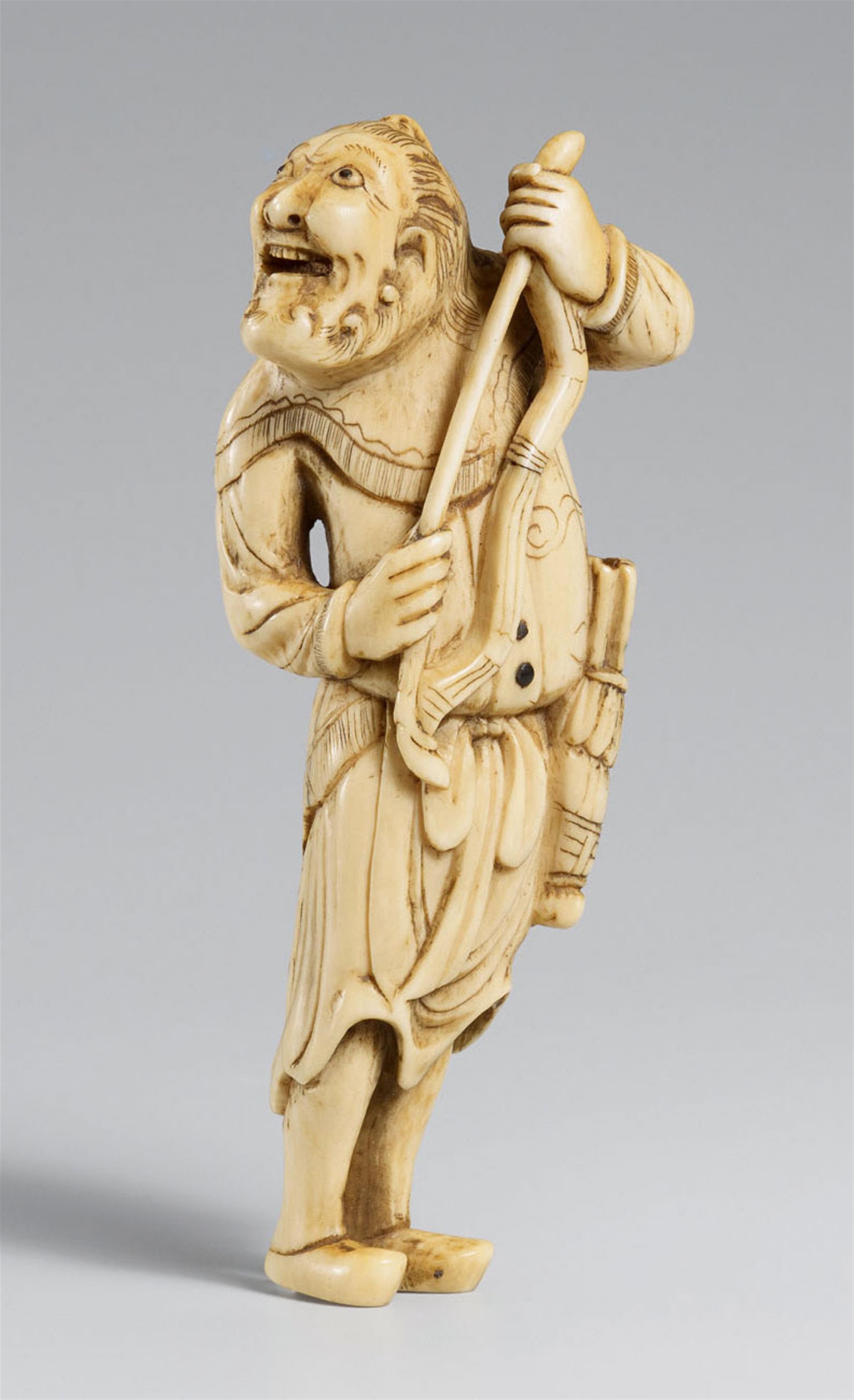 An ivory netsuke of a laughing Mongolian archer. Late 18th/early 19th century - image-1