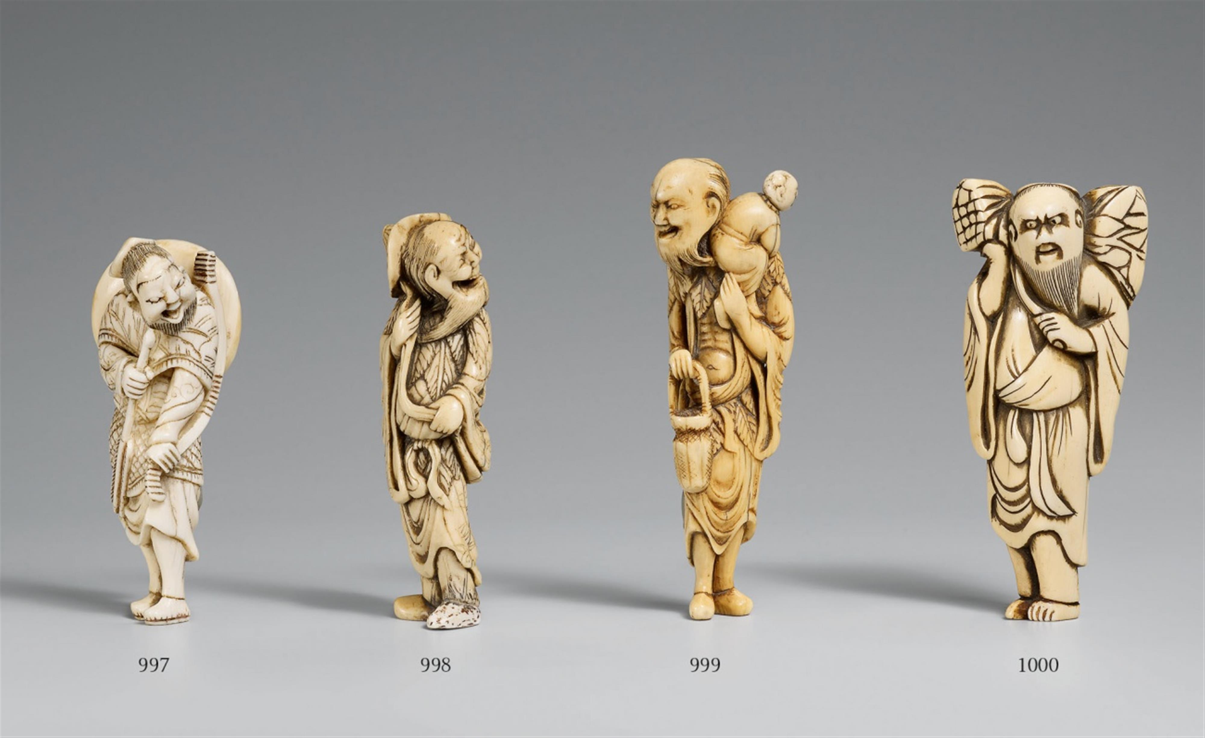 An ivory netsuke of a laughing sennin with a child. Late 18th century - image-1