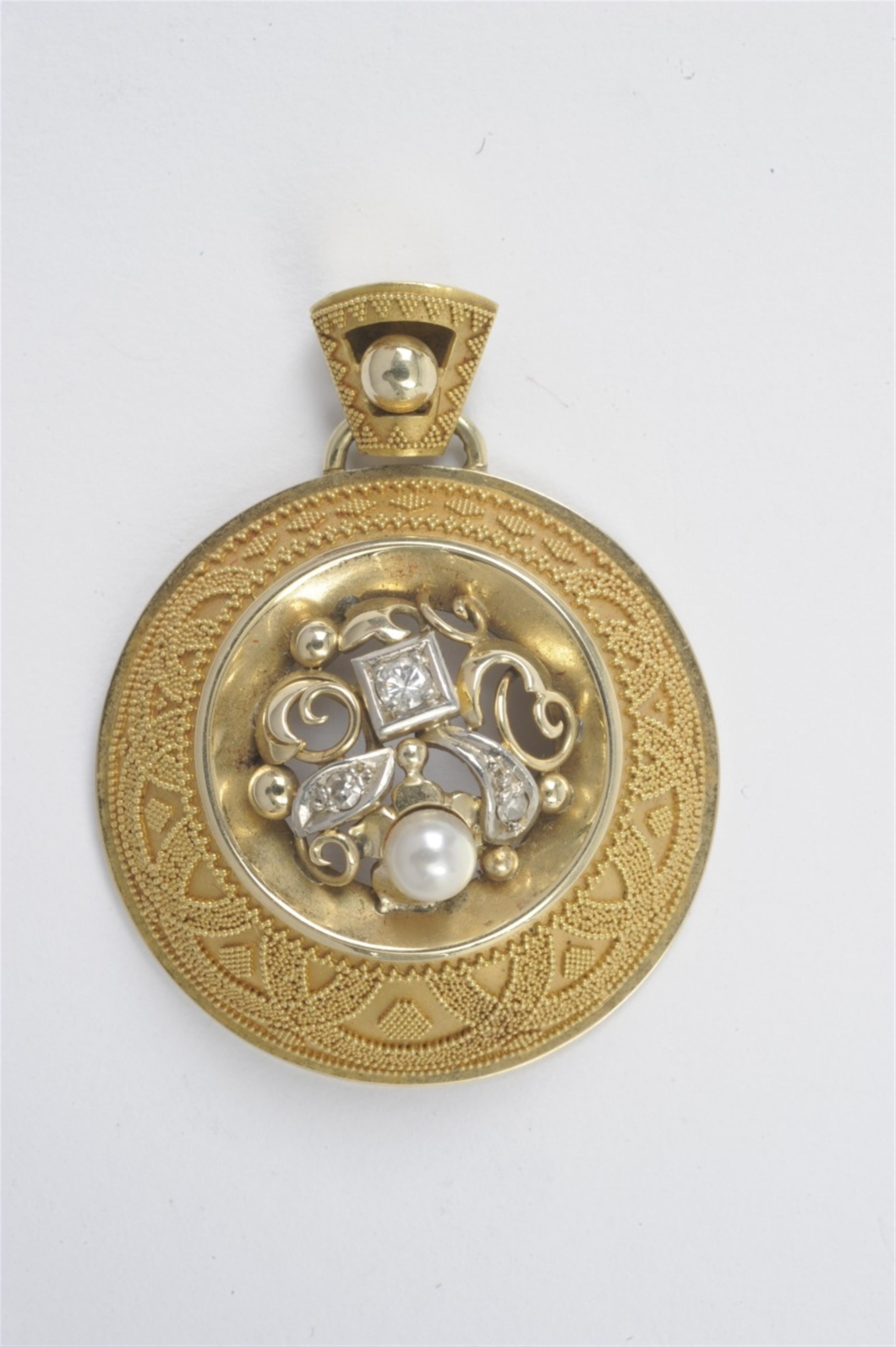A 14k granulated gold pendant - image-1