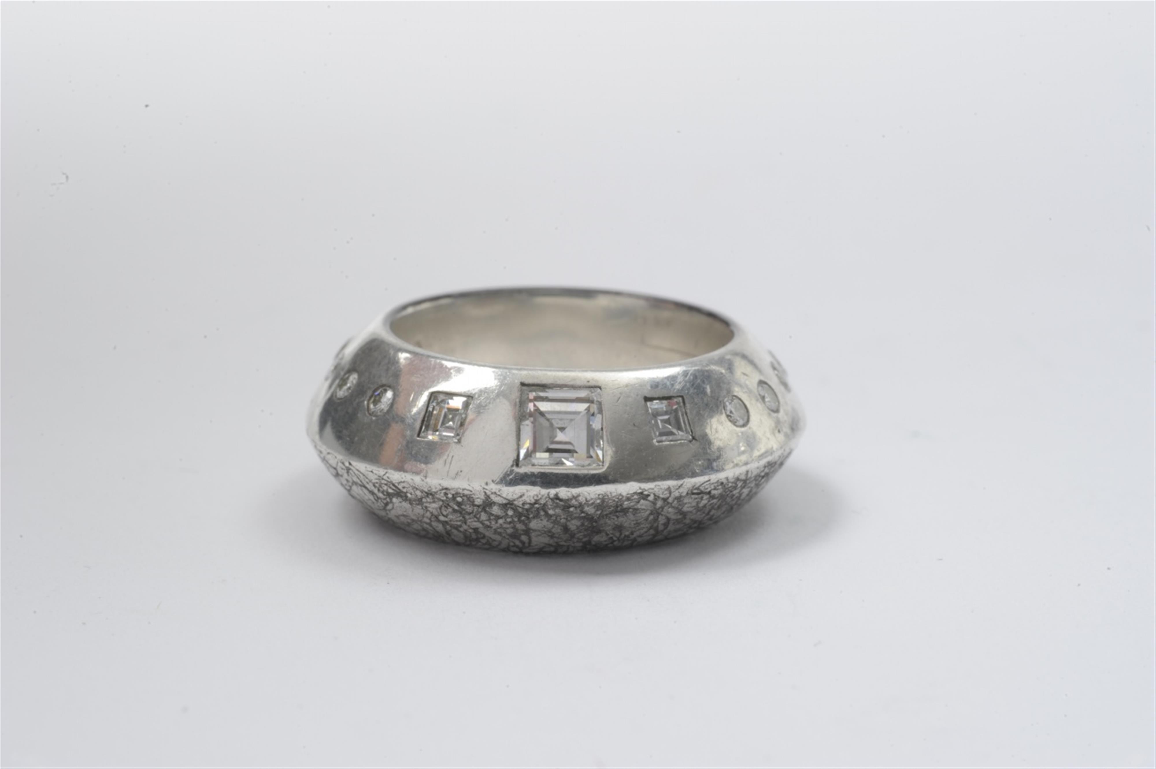 A Sterling silver and diamond ring - image-1