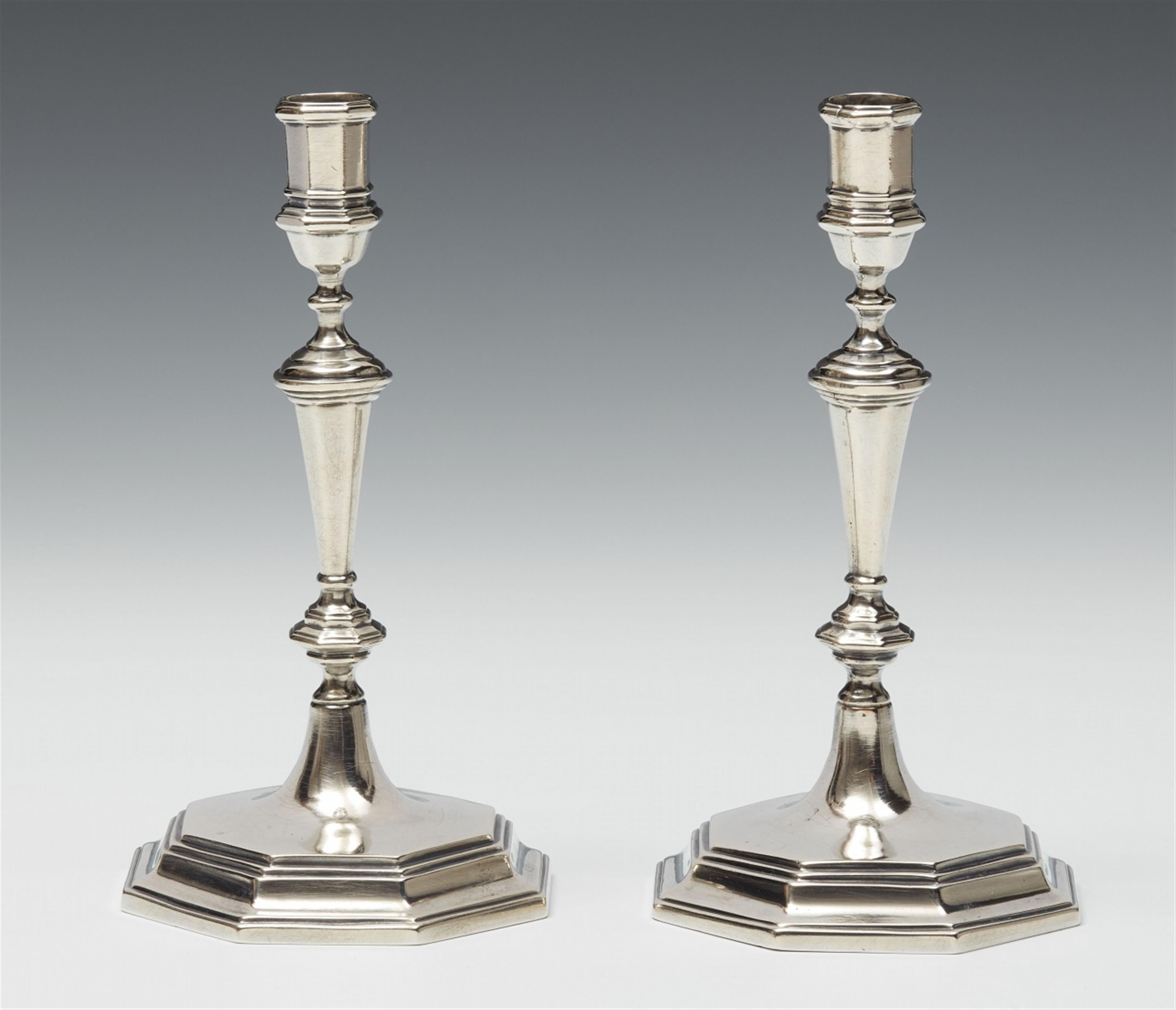 A pair of miniature silver candelabra. Unidentified maker's mark "DM", 18th/19th C. - image-1