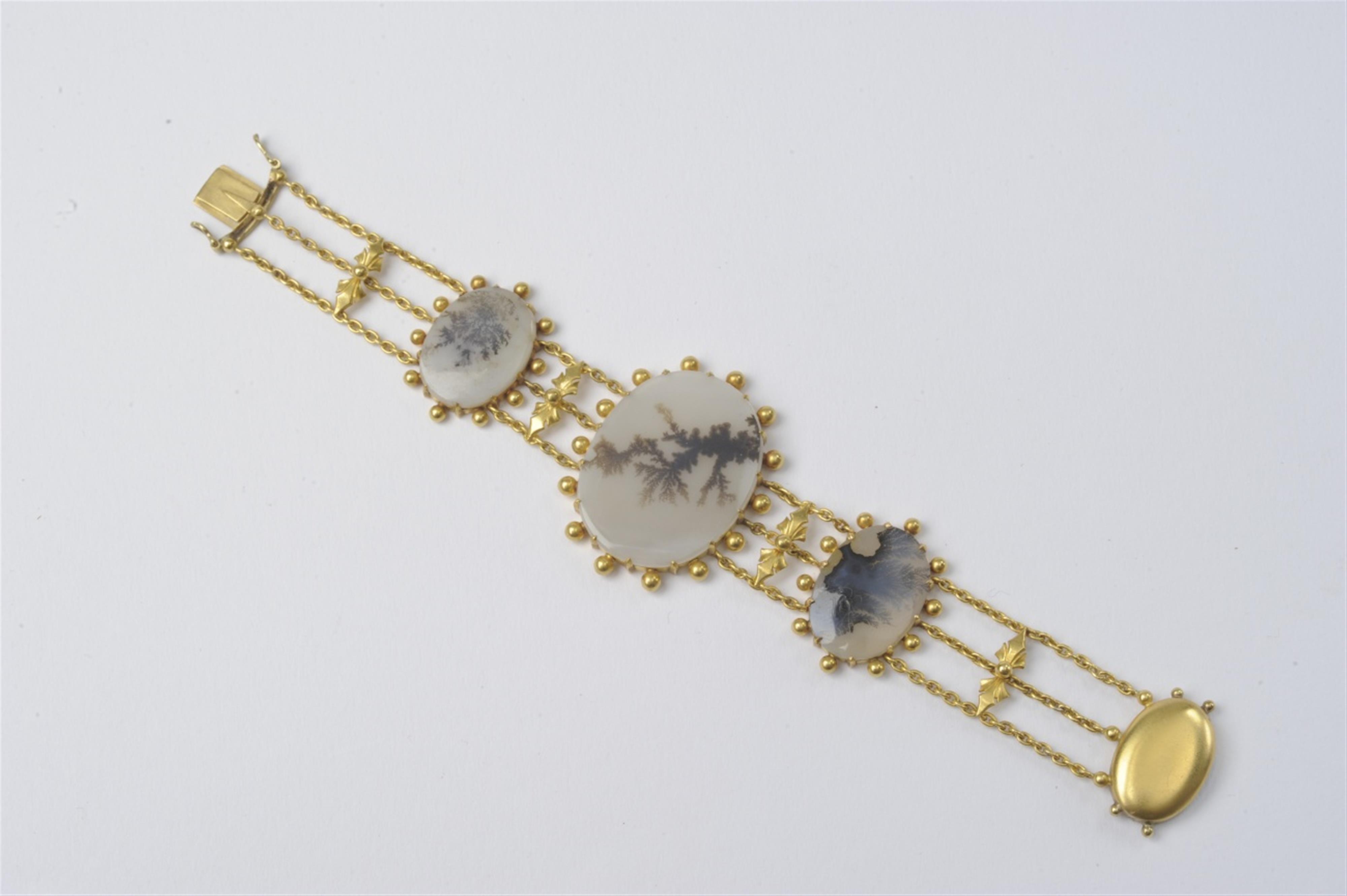 An 18k gold and dendrite bracelet - image-1