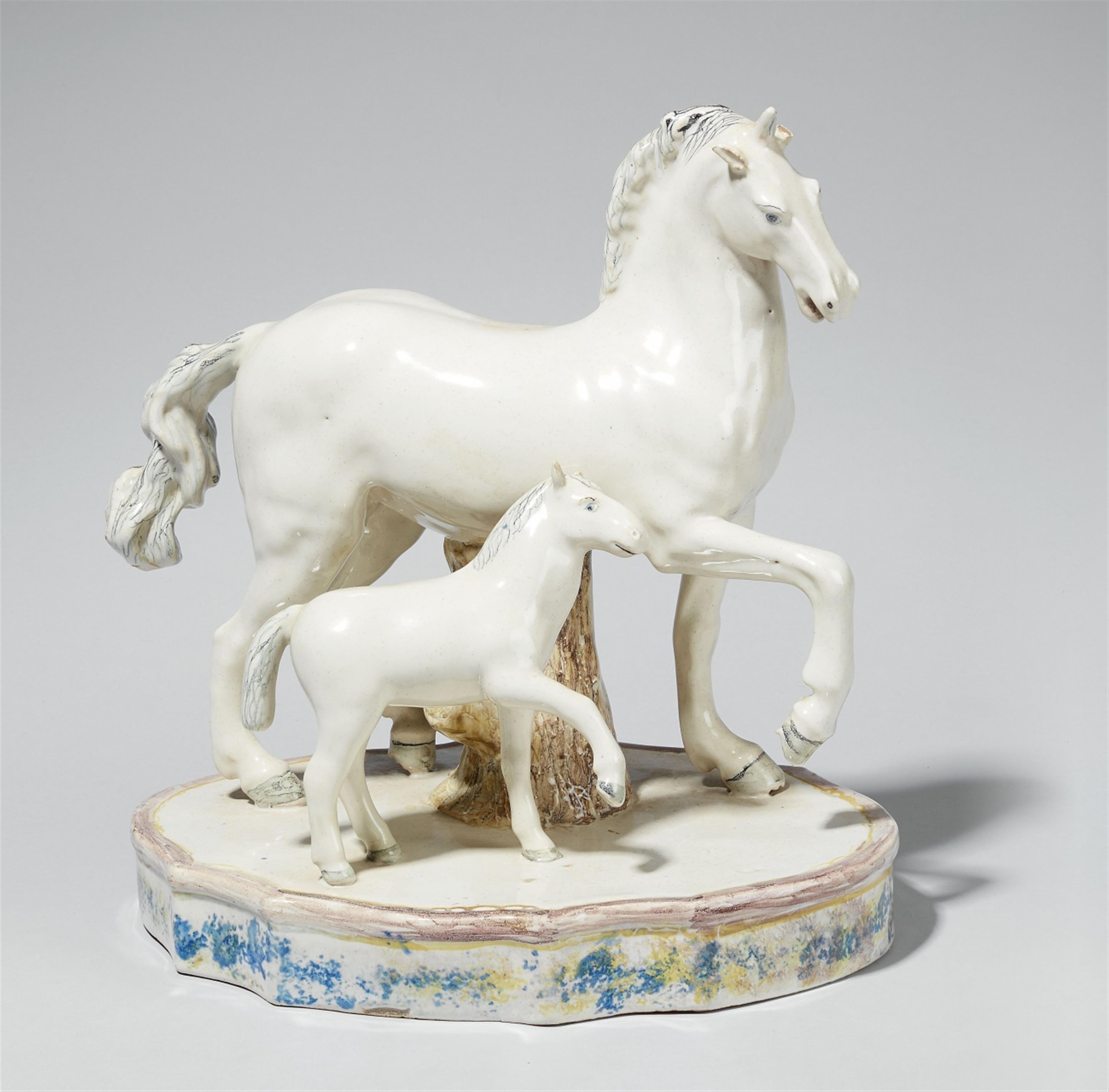 A Continental white-glazed faience model of a unicorn and foal - image-2