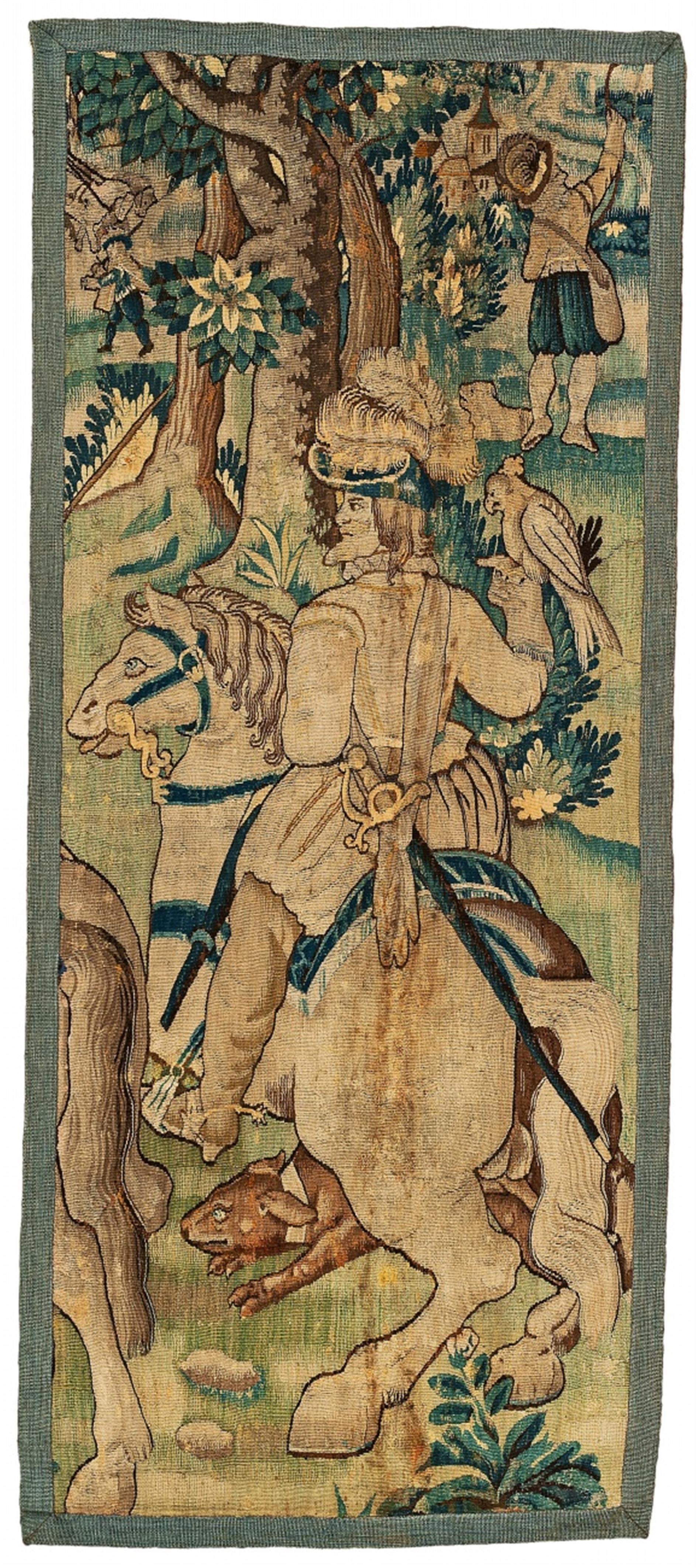 A Flemish wool and silk tapestry fragment with a mounted falkner - image-1
