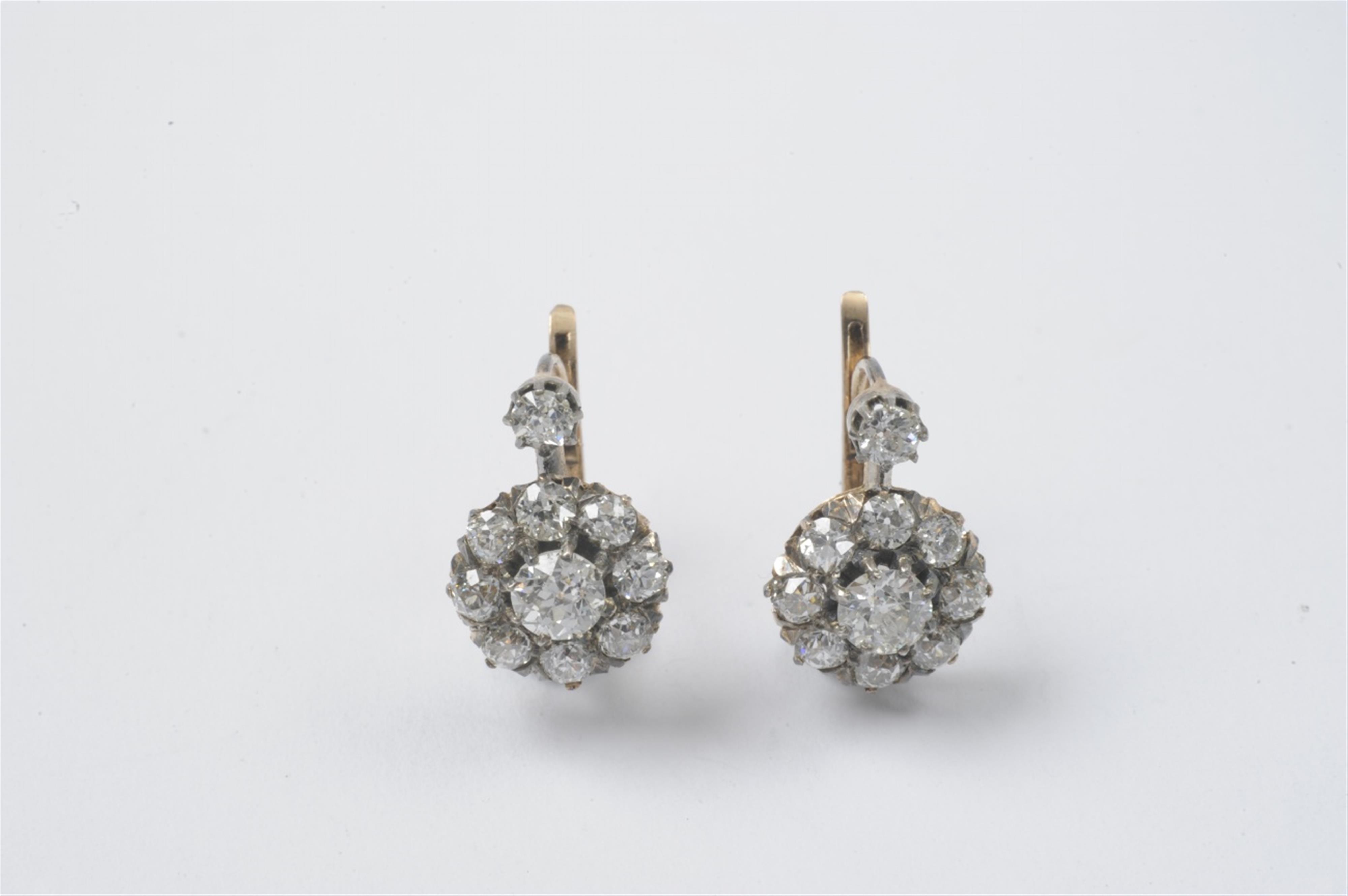 A pair of 18k red gold and silver Belle Epoque stud earrings - image-1
