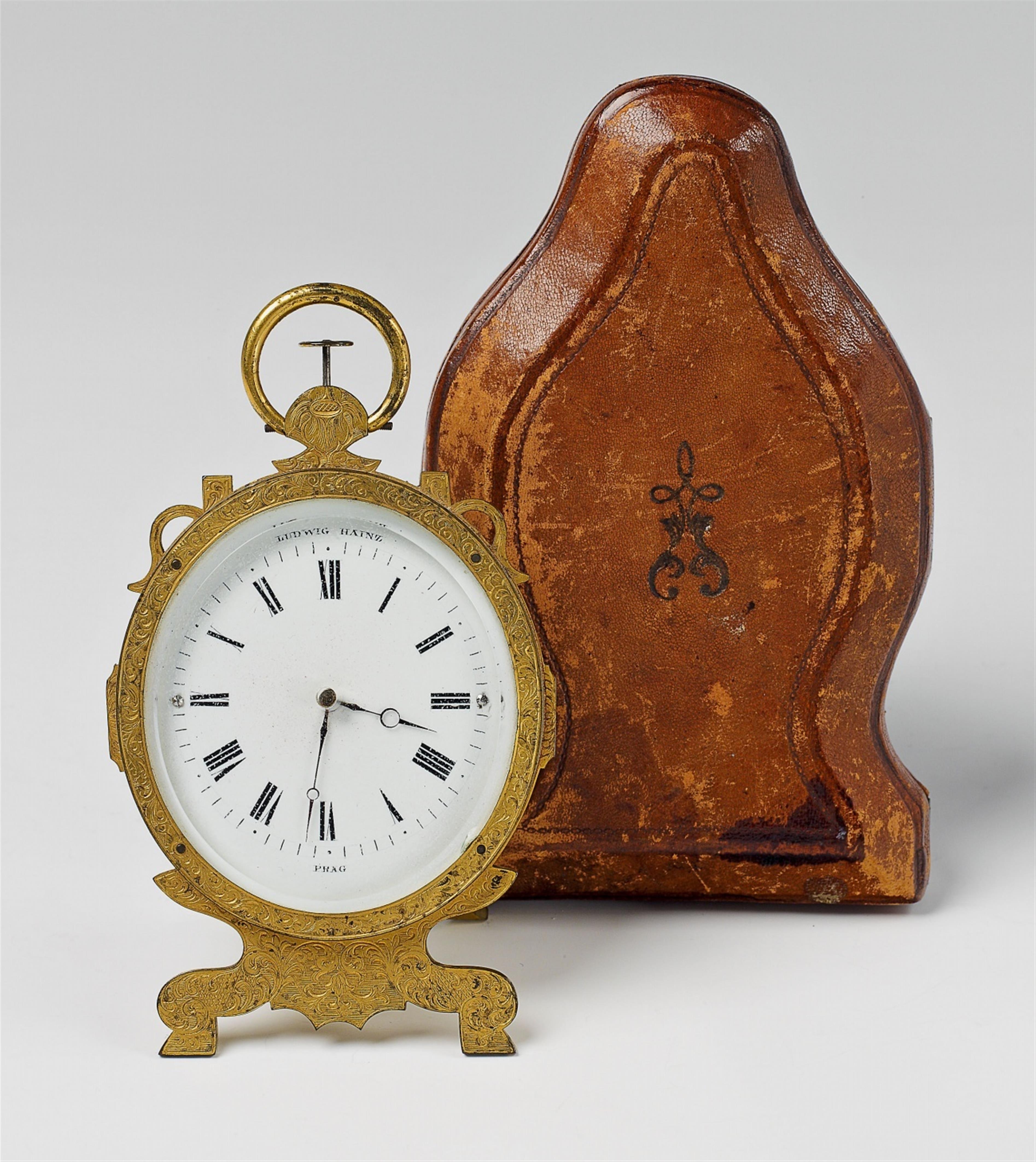 A Praque fire-gilt bronze travel clock - image-1