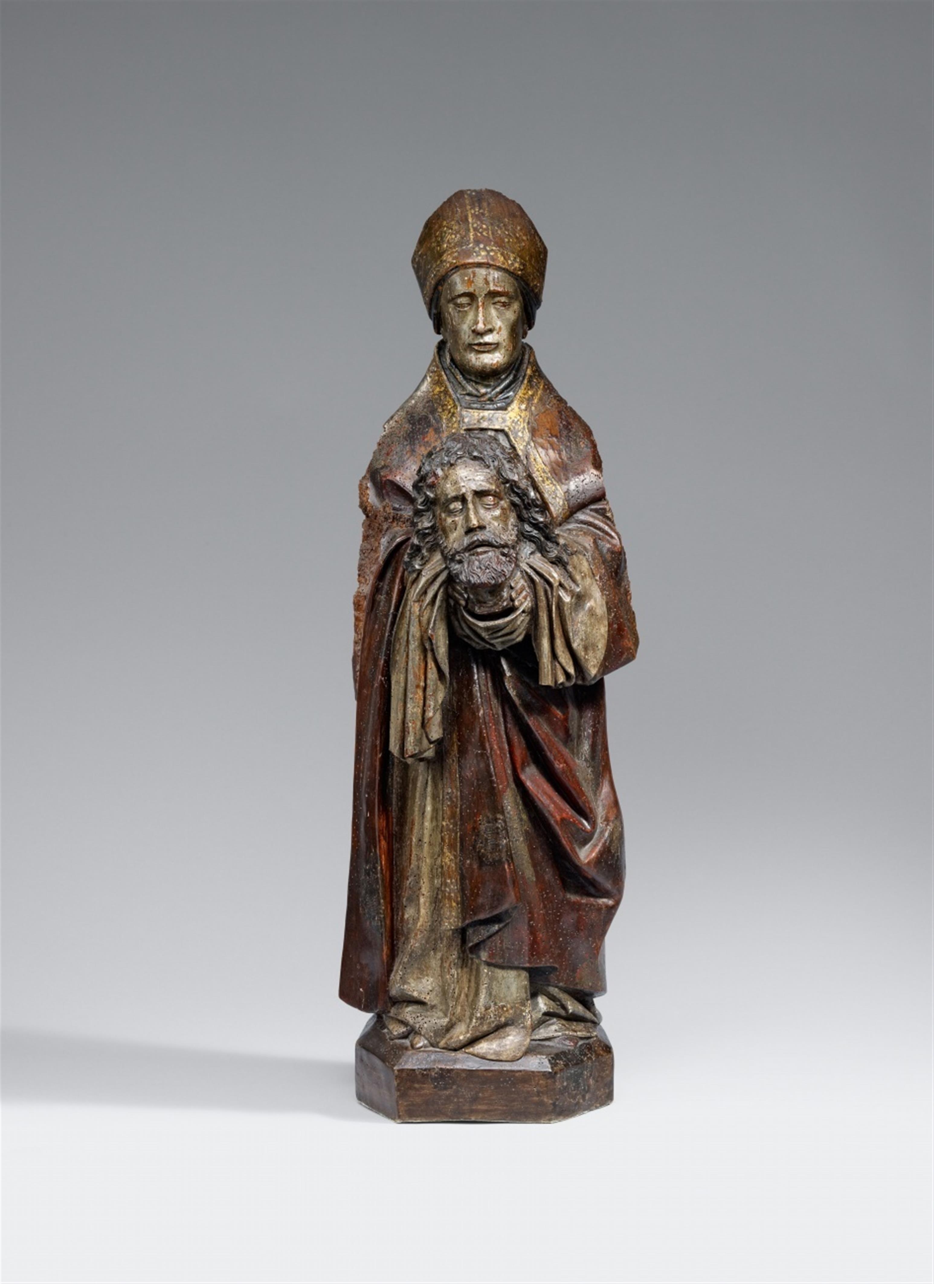 Probably France second half 15th century - A presumably French carved wooden figure of a Bishop Saint (possibly Dionysius), second half 15th century. - image-1