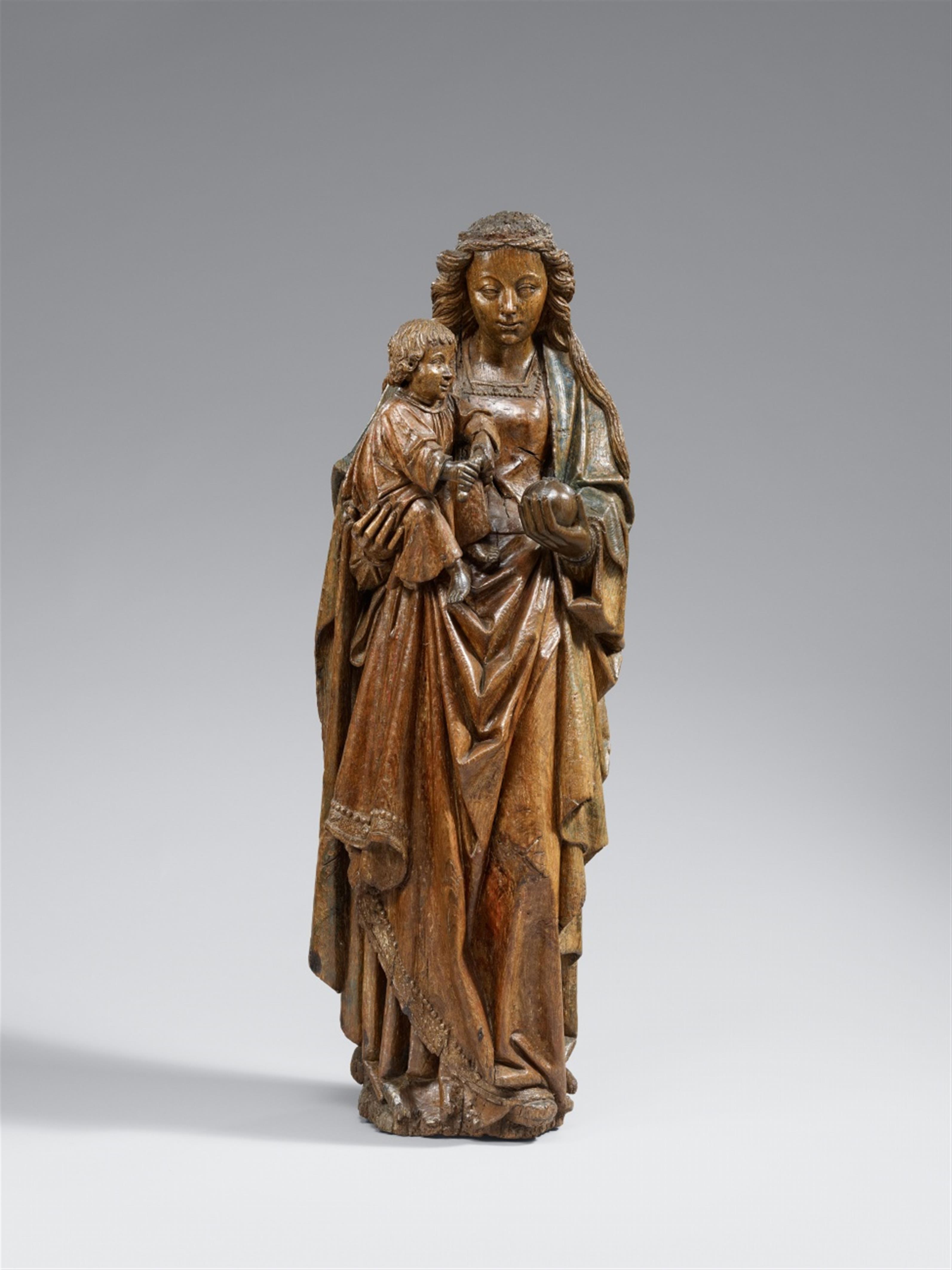 Flemish circa 1520 - A Flemish carved wooden figure of the Virgin and Child, circa 1520 - image-1