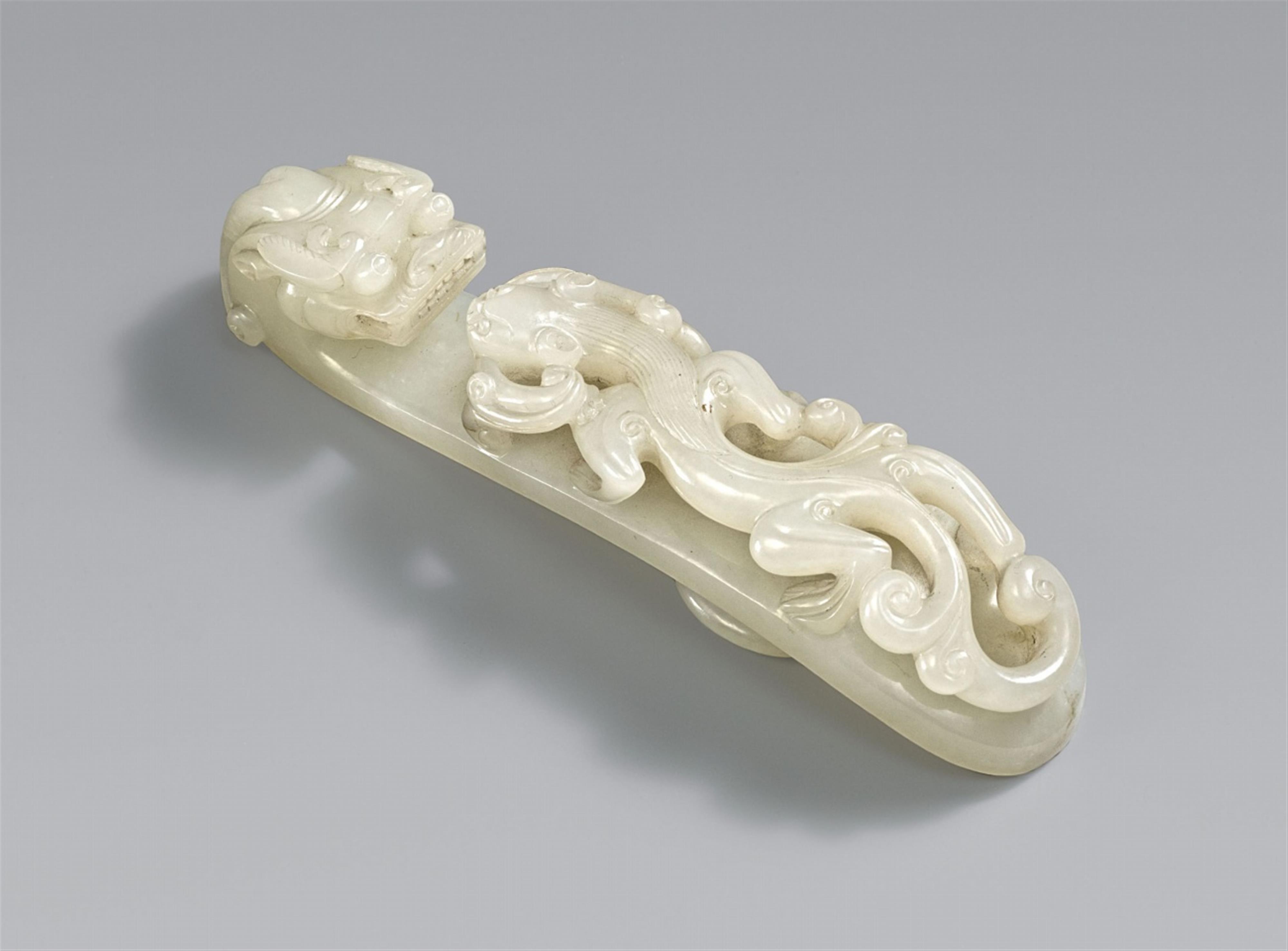 A large, white jade belt hook. Qing dynasty - image-1