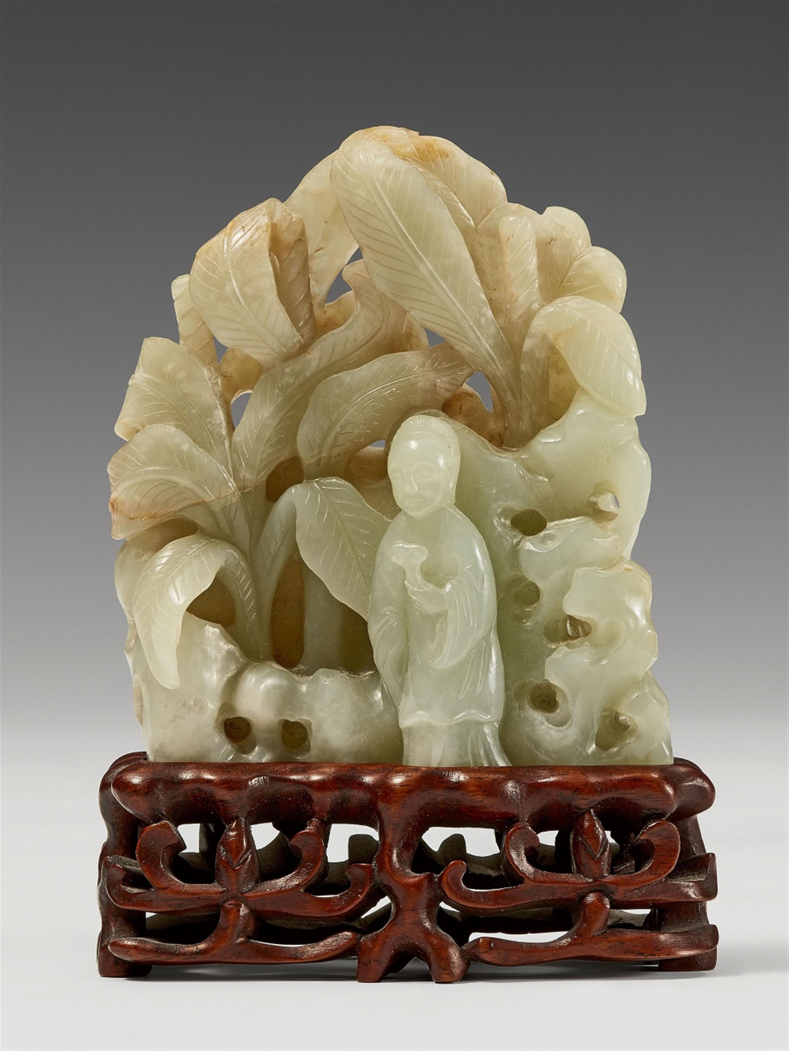 A light green jade carving of Guanyin under plantain trees. Qing dynasty - image-1