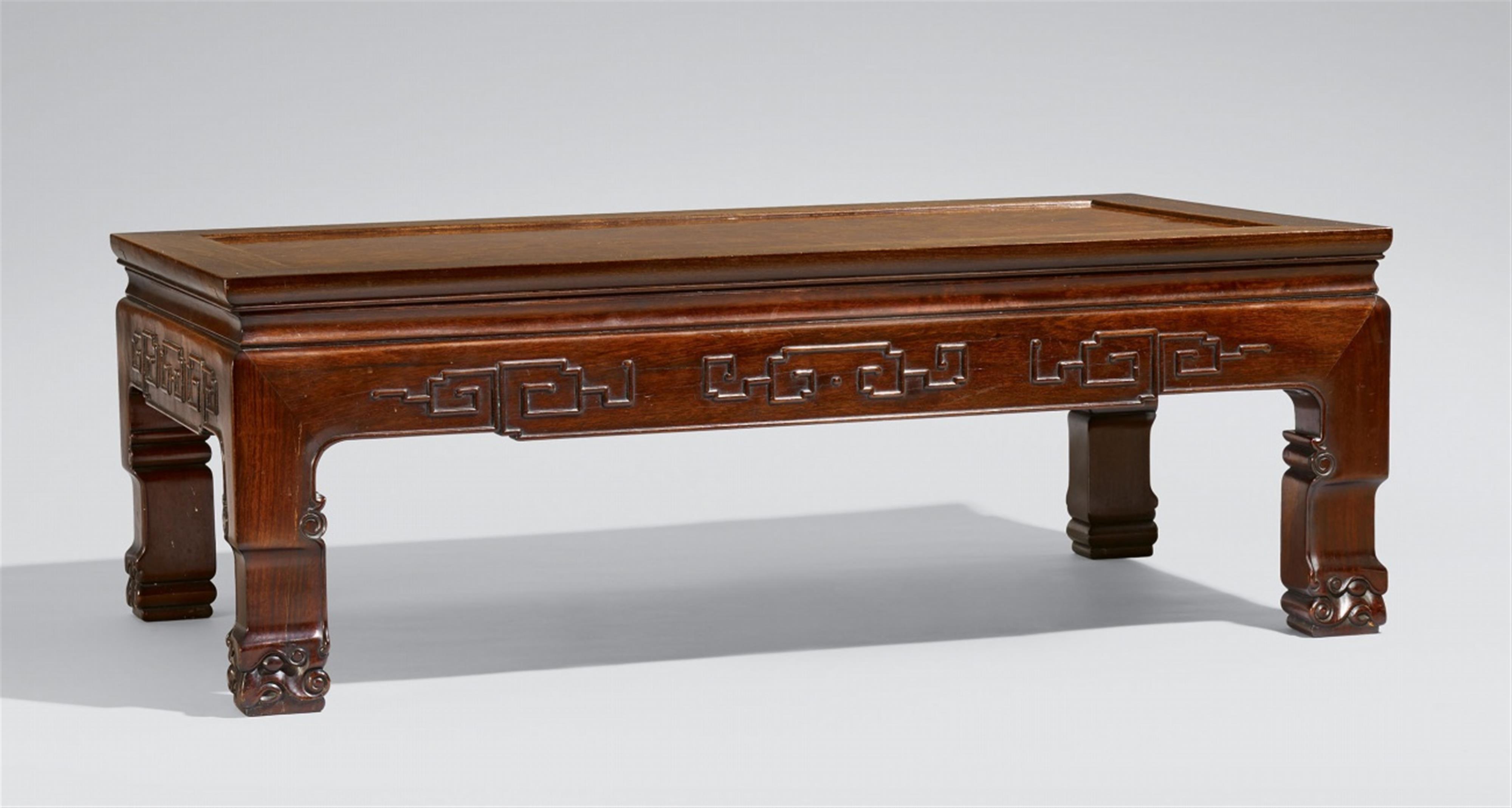 A low hardwood table - image-1