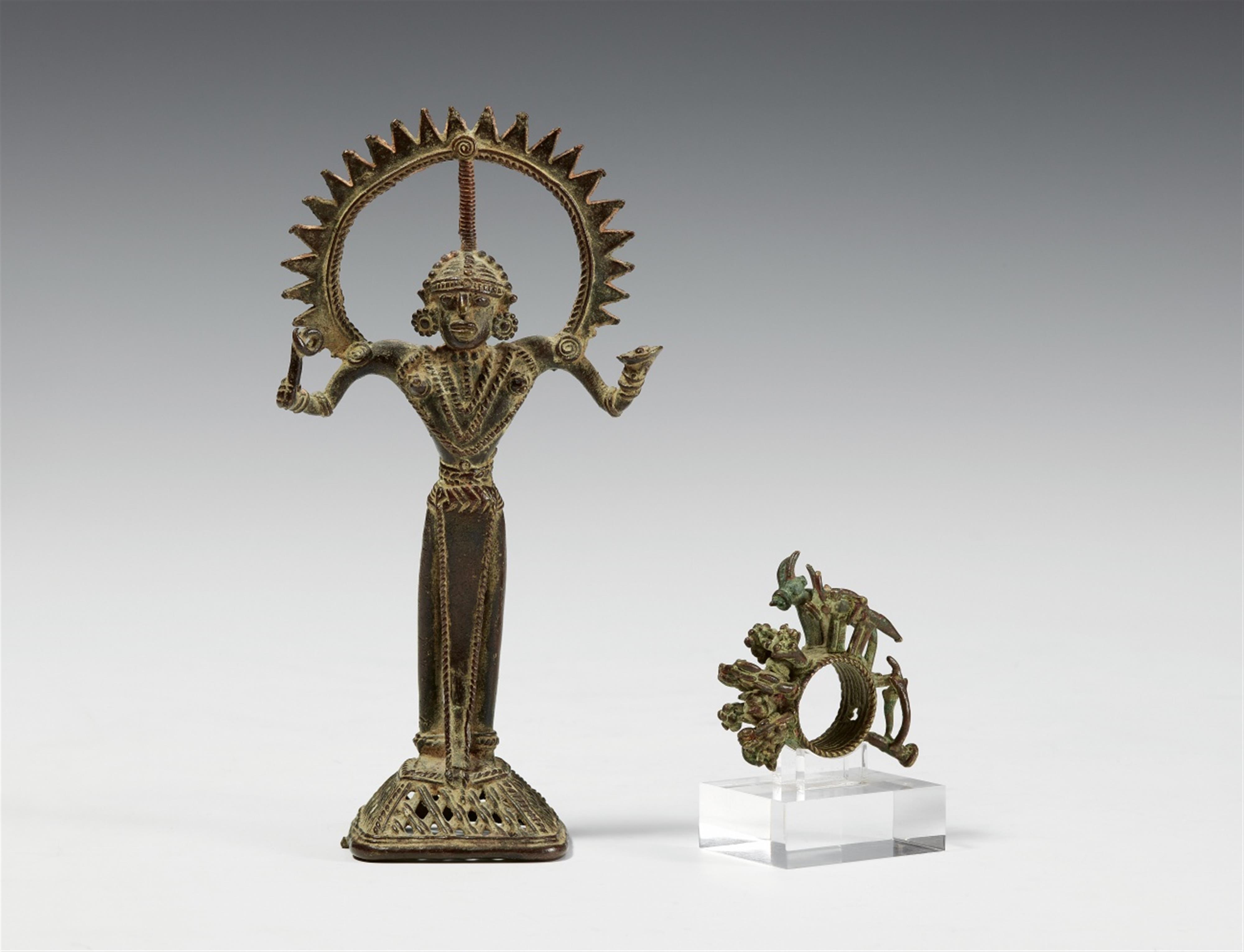 A Bastar copper alloy figure and a ritual ring. 20th century - image-1