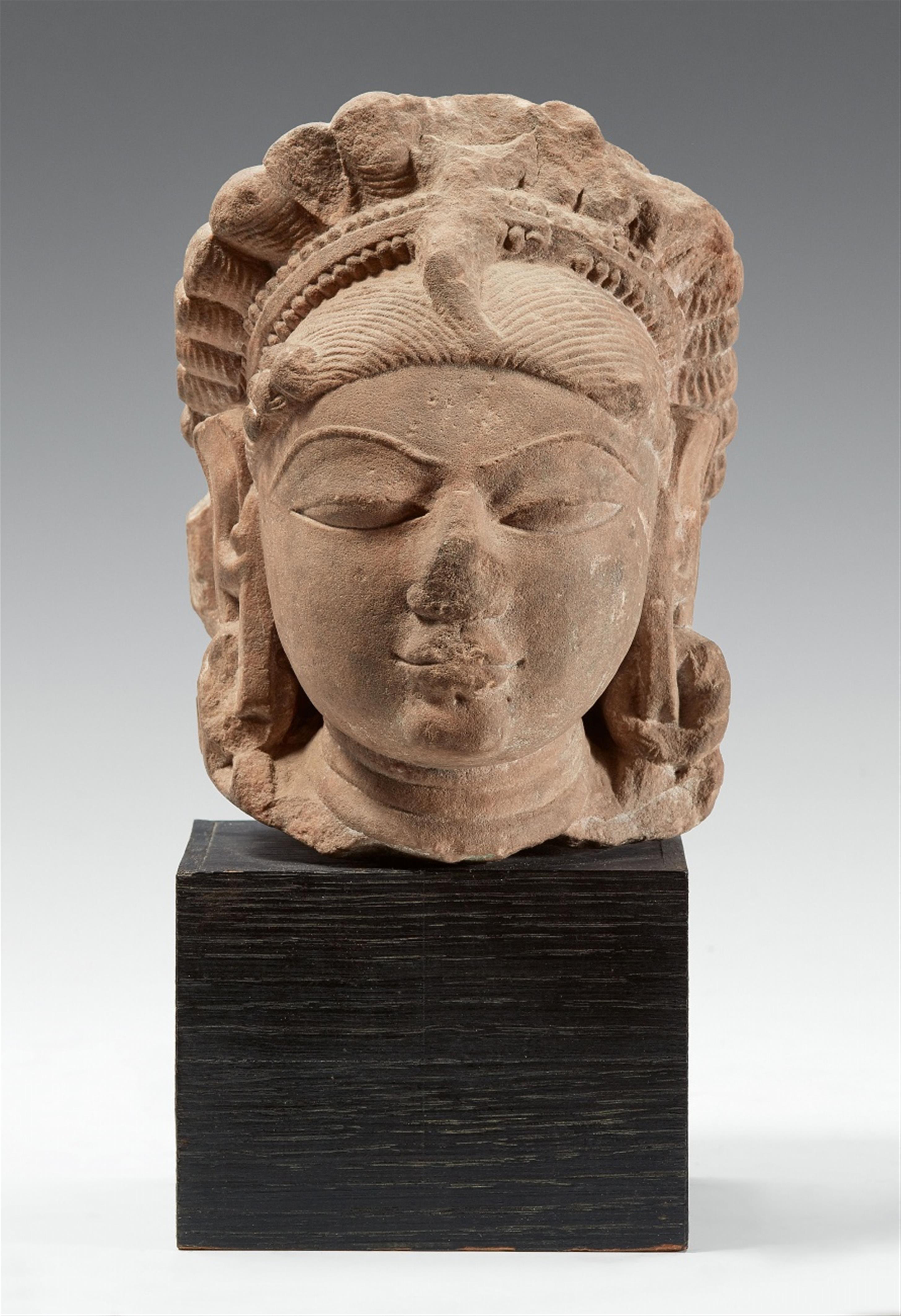 A Central Indian sandstone head of a Hindu deity. 10th/12th century - image-1