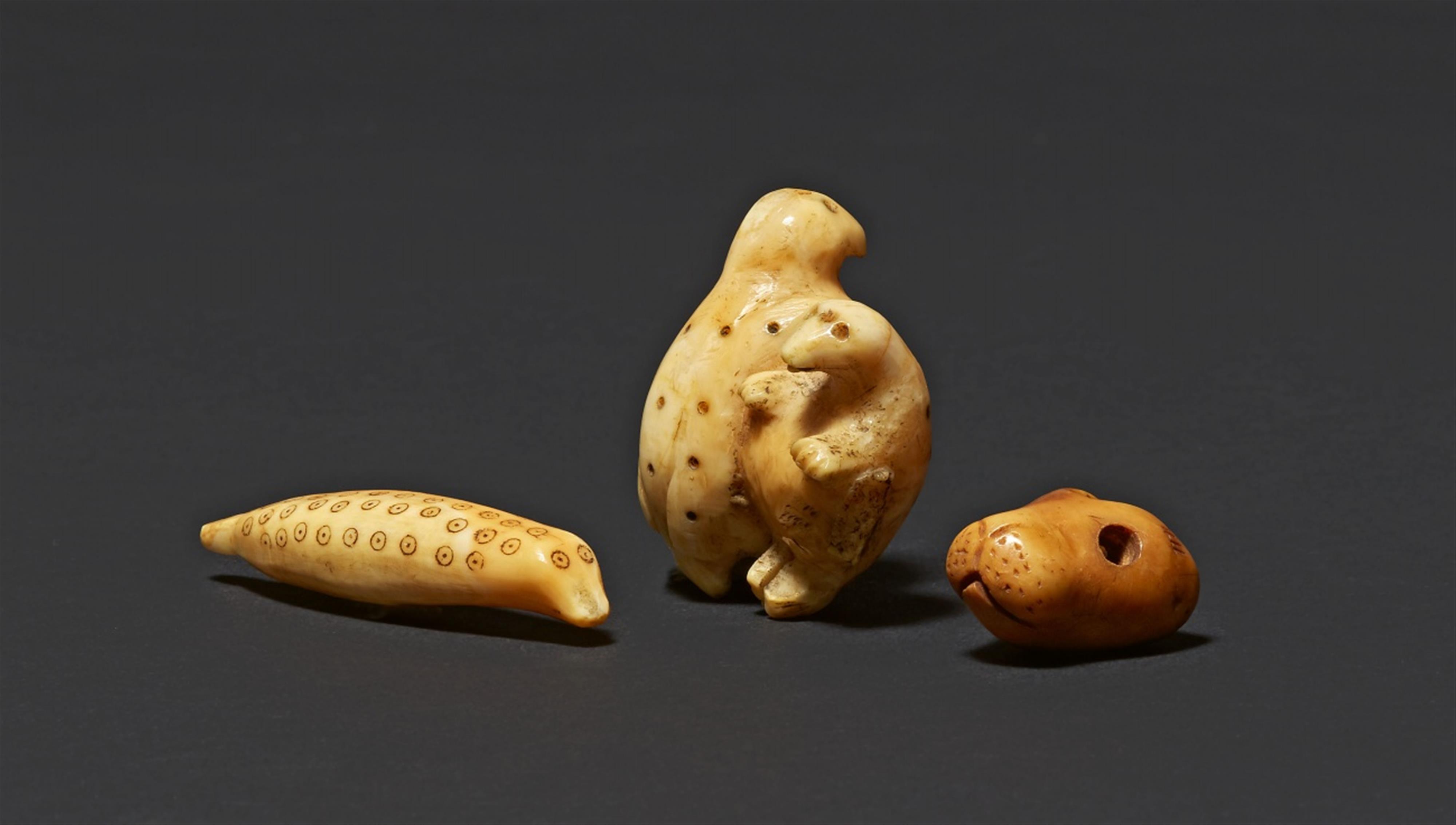 THREE INUIT IVORY CARVINGS - image-1