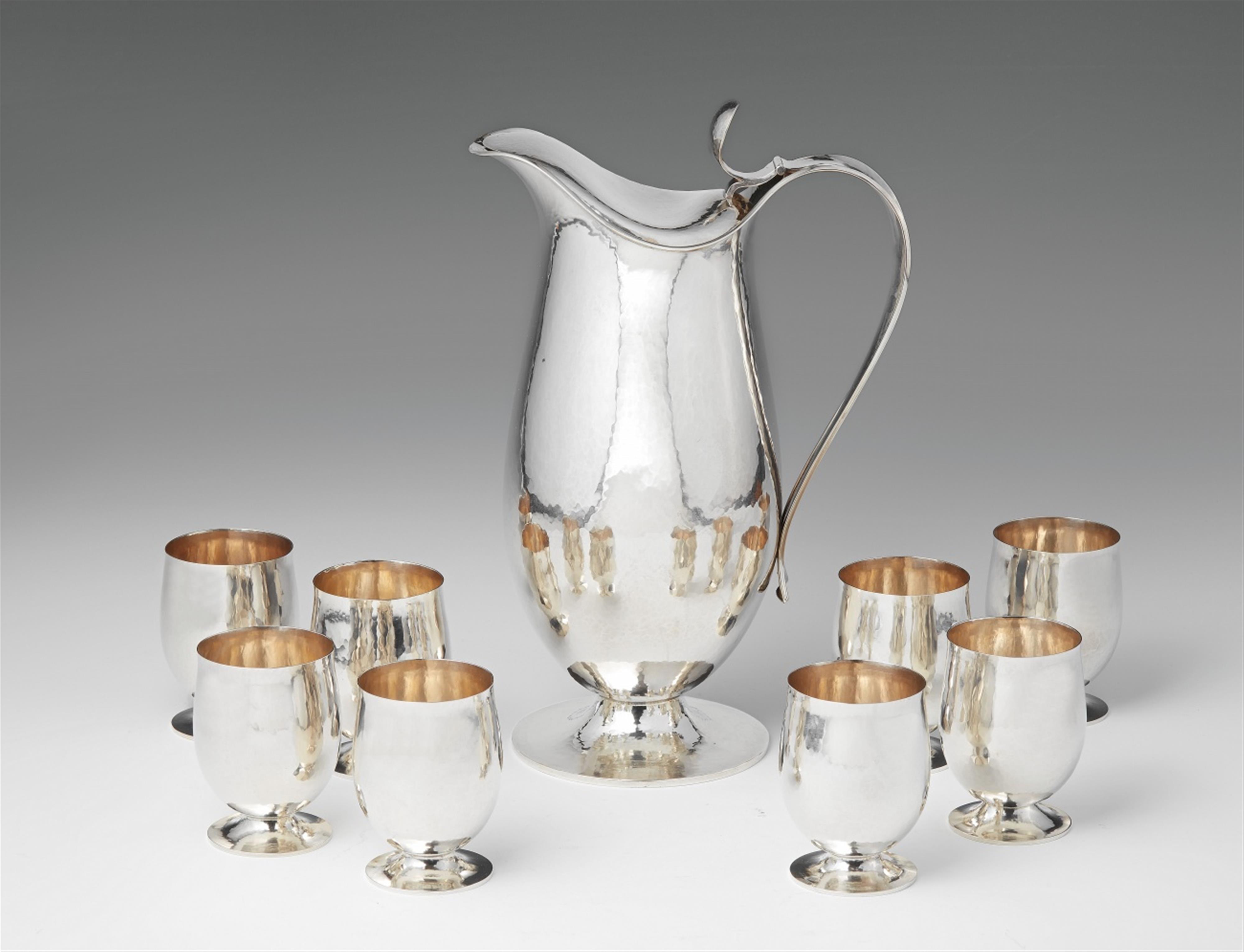 An Art Deco Leipzig silver wine garniture - image-1