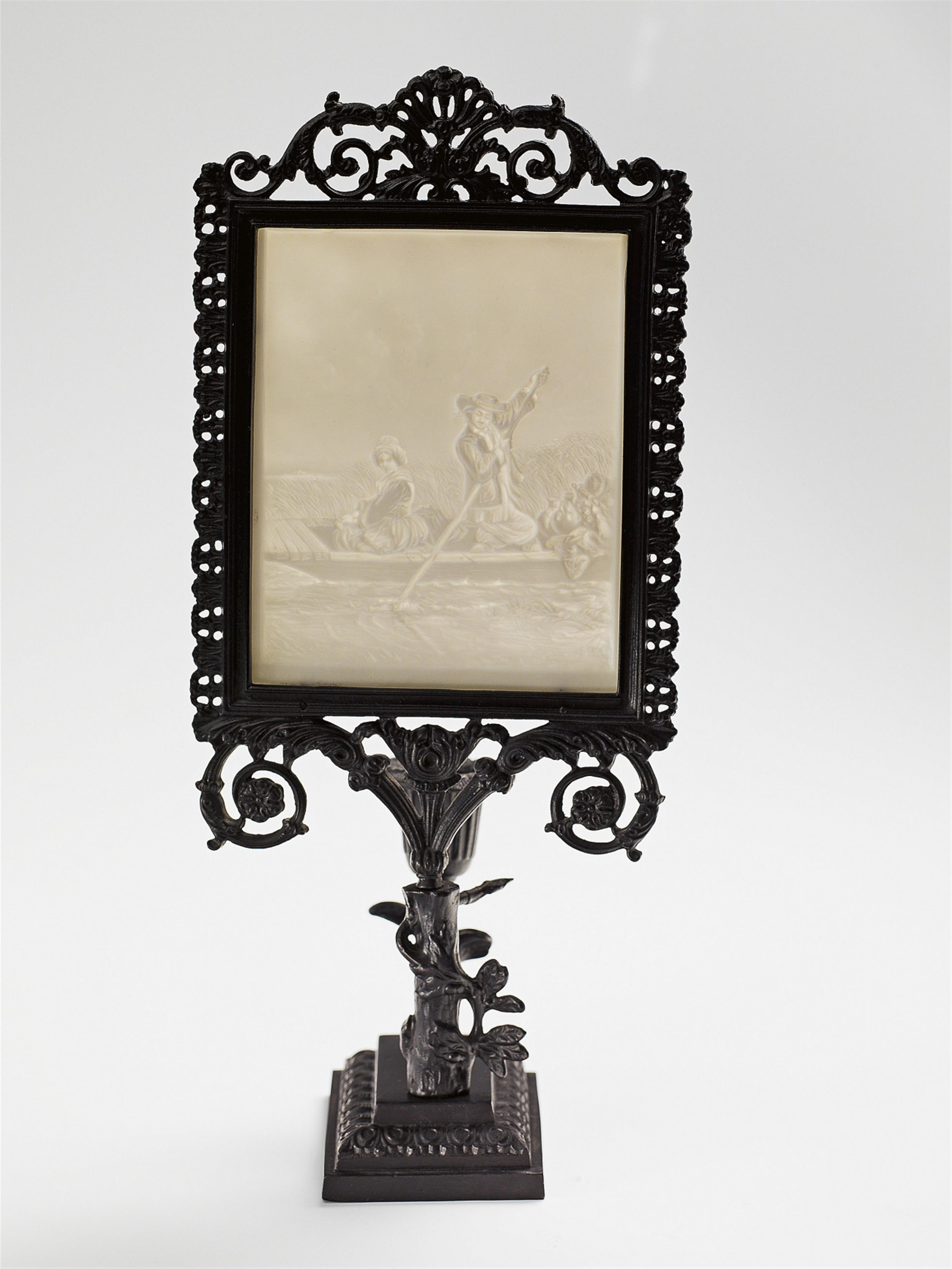 A Berlin cast iron lithophane stand with a candle holder - image-1