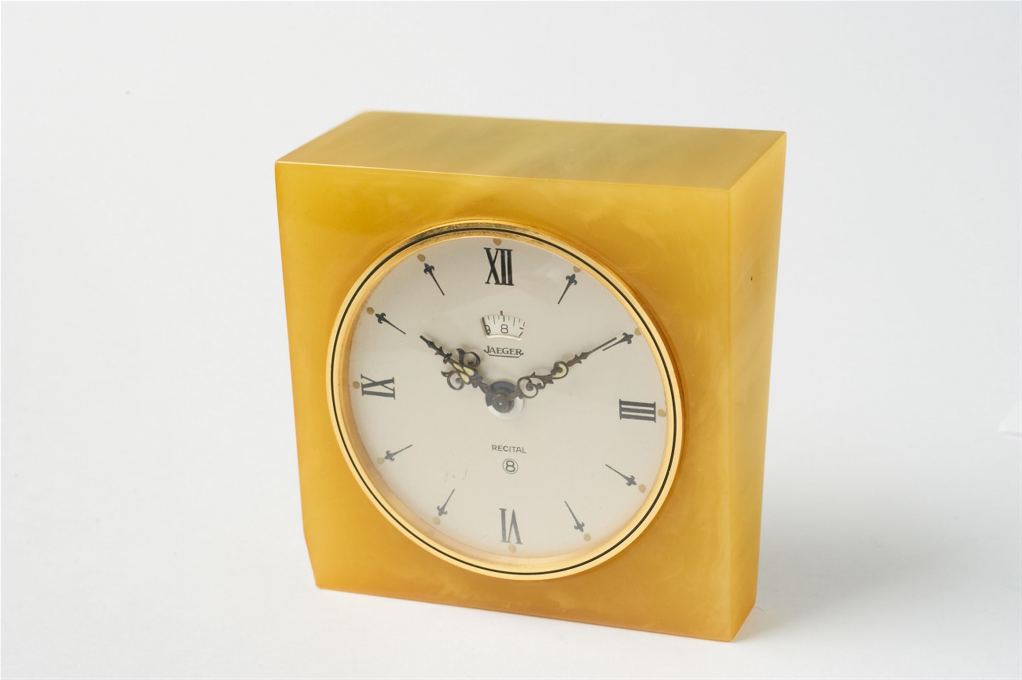 A Jaeger Le Coultre gilt metal and marble-effect bakelite table alarm clock - image-3