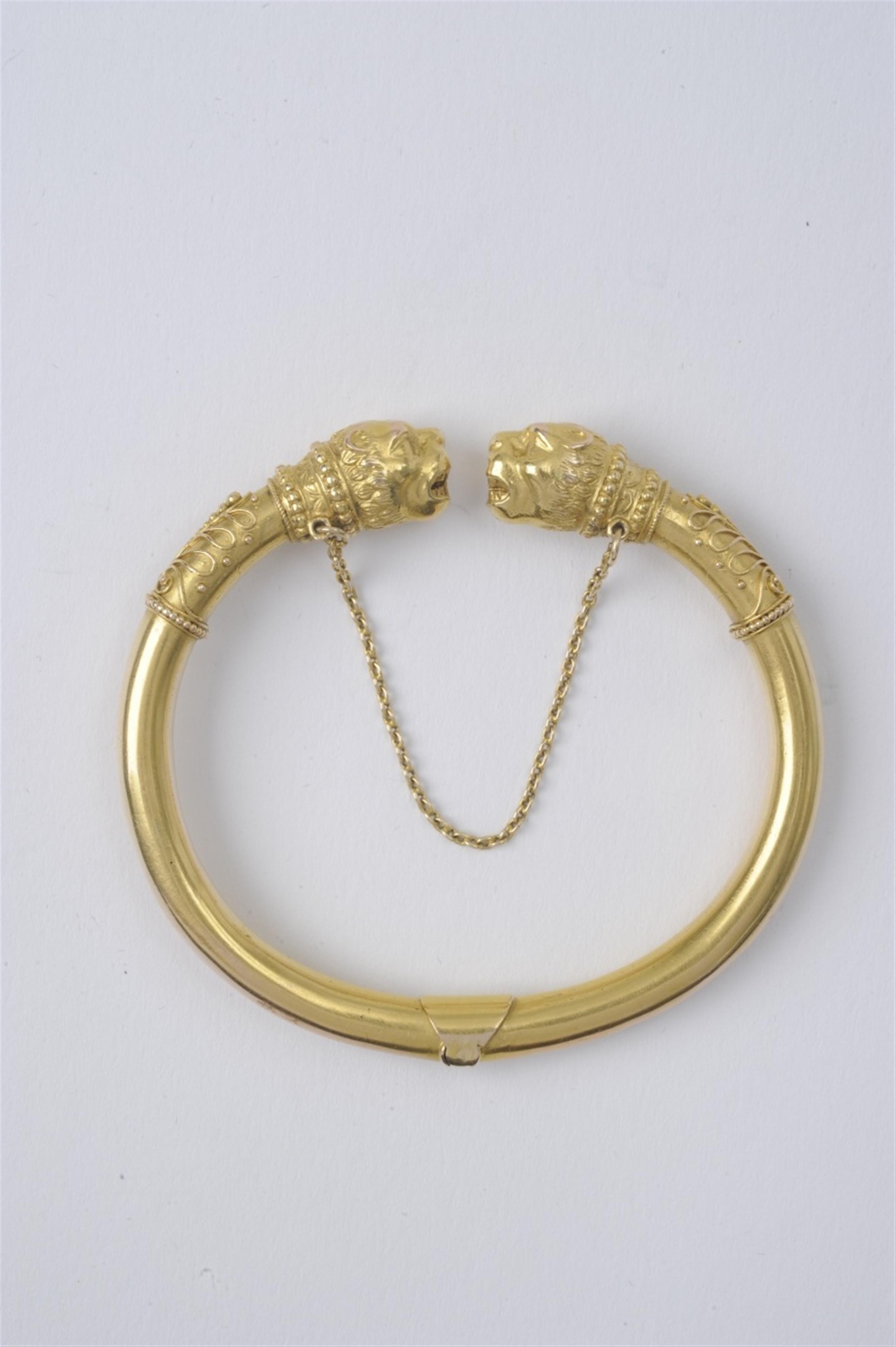 A 14k gold bracelet with lion mascarons - image-1