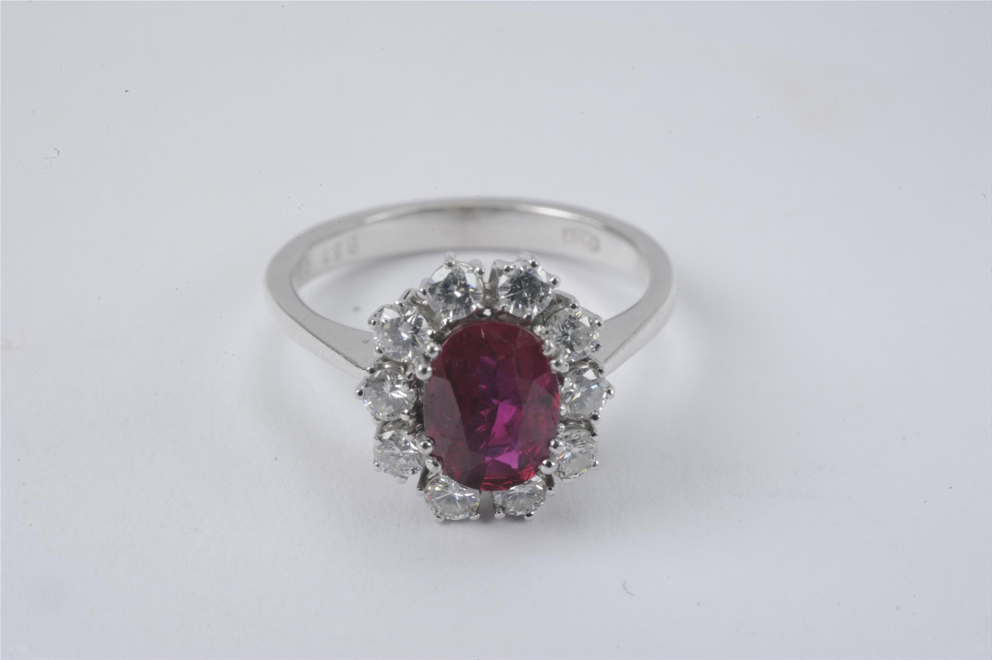An 18k gold and ruby cluster ring - image-1