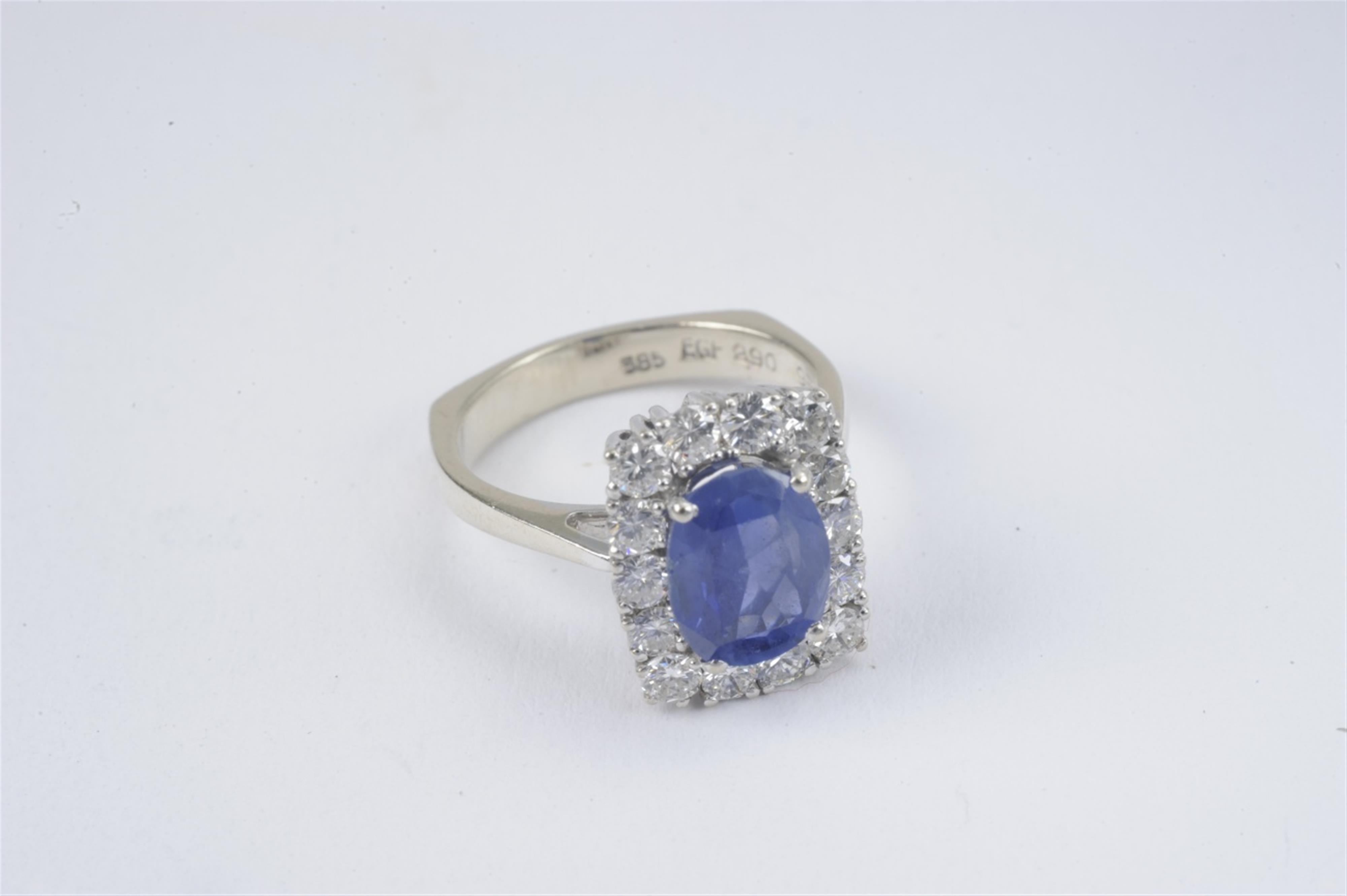 A 14k white gold and sapphire ring - image-1