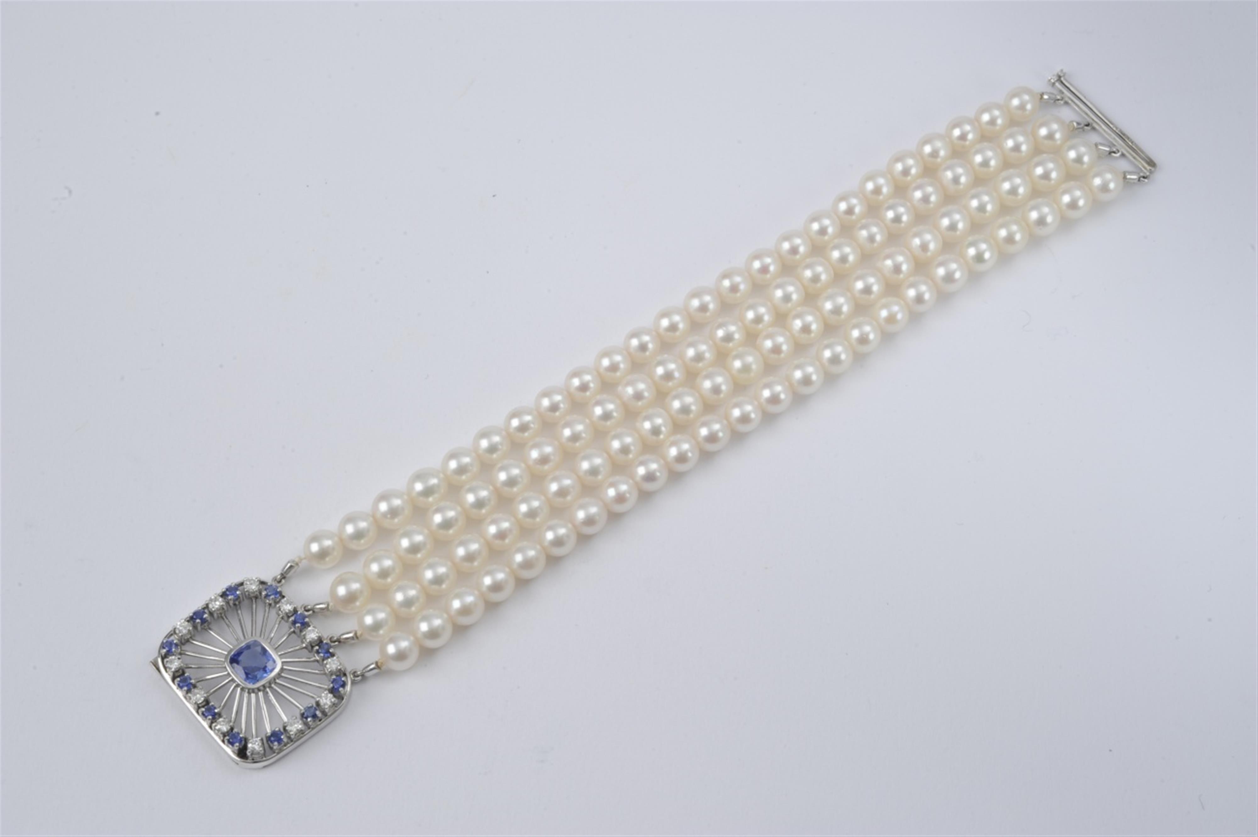 A 14k white gold, pearl and sapphire bracelet - image-1