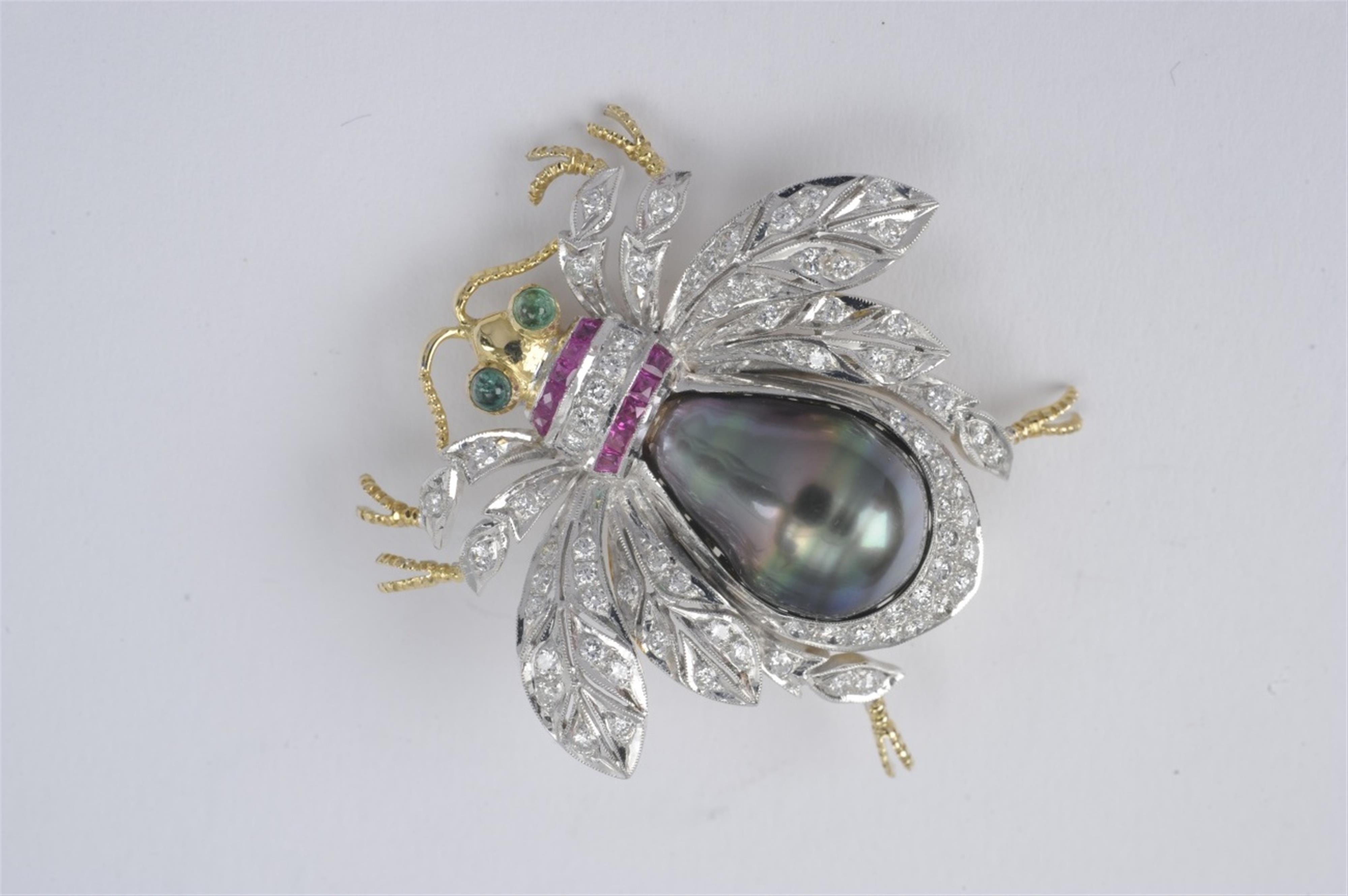 An 18k white and yellow gold and Tahiti pearl brooch - image-1
