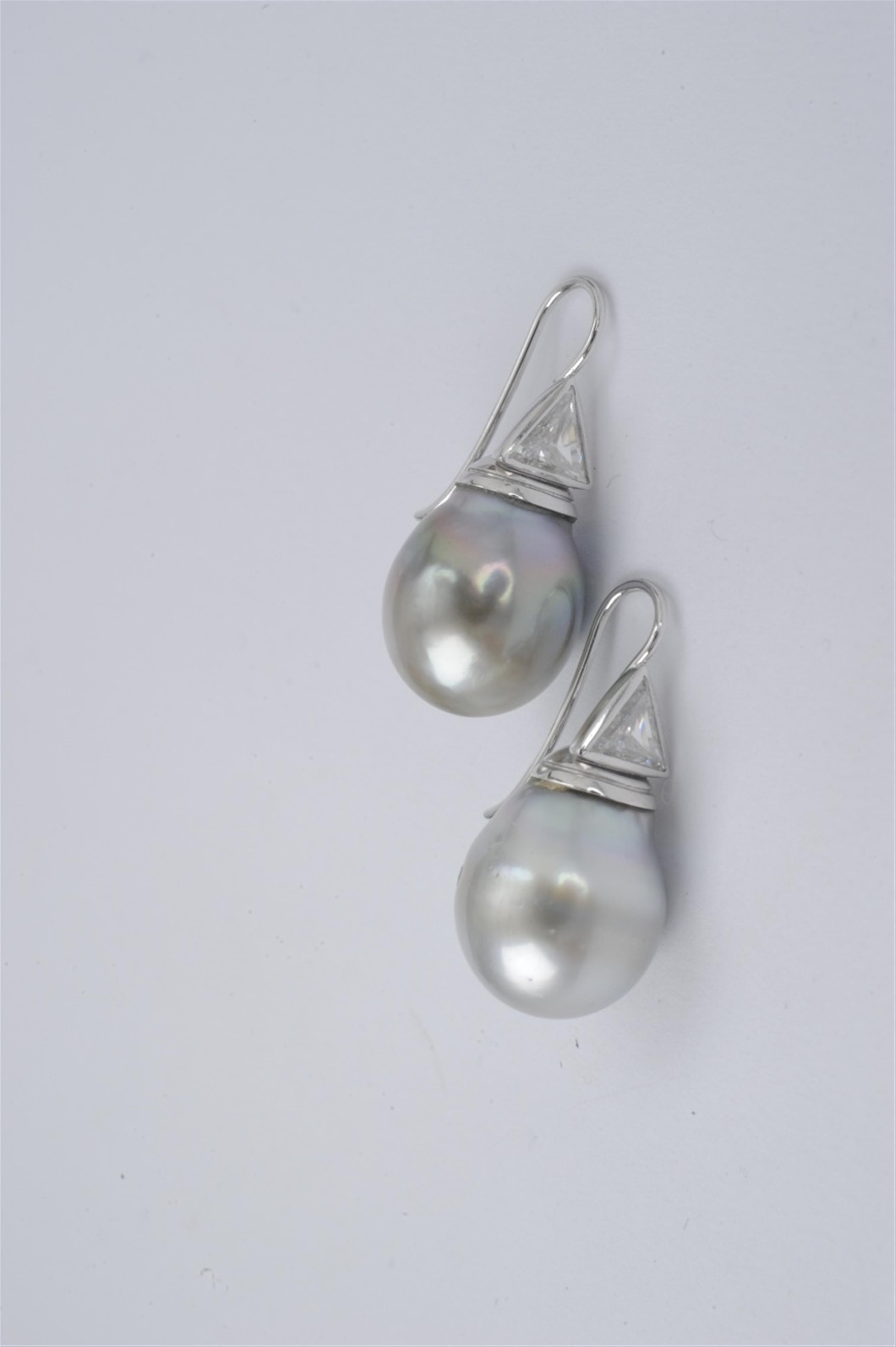 A pair of 18k gold and Tahiti pearl pendant earrings - image-1